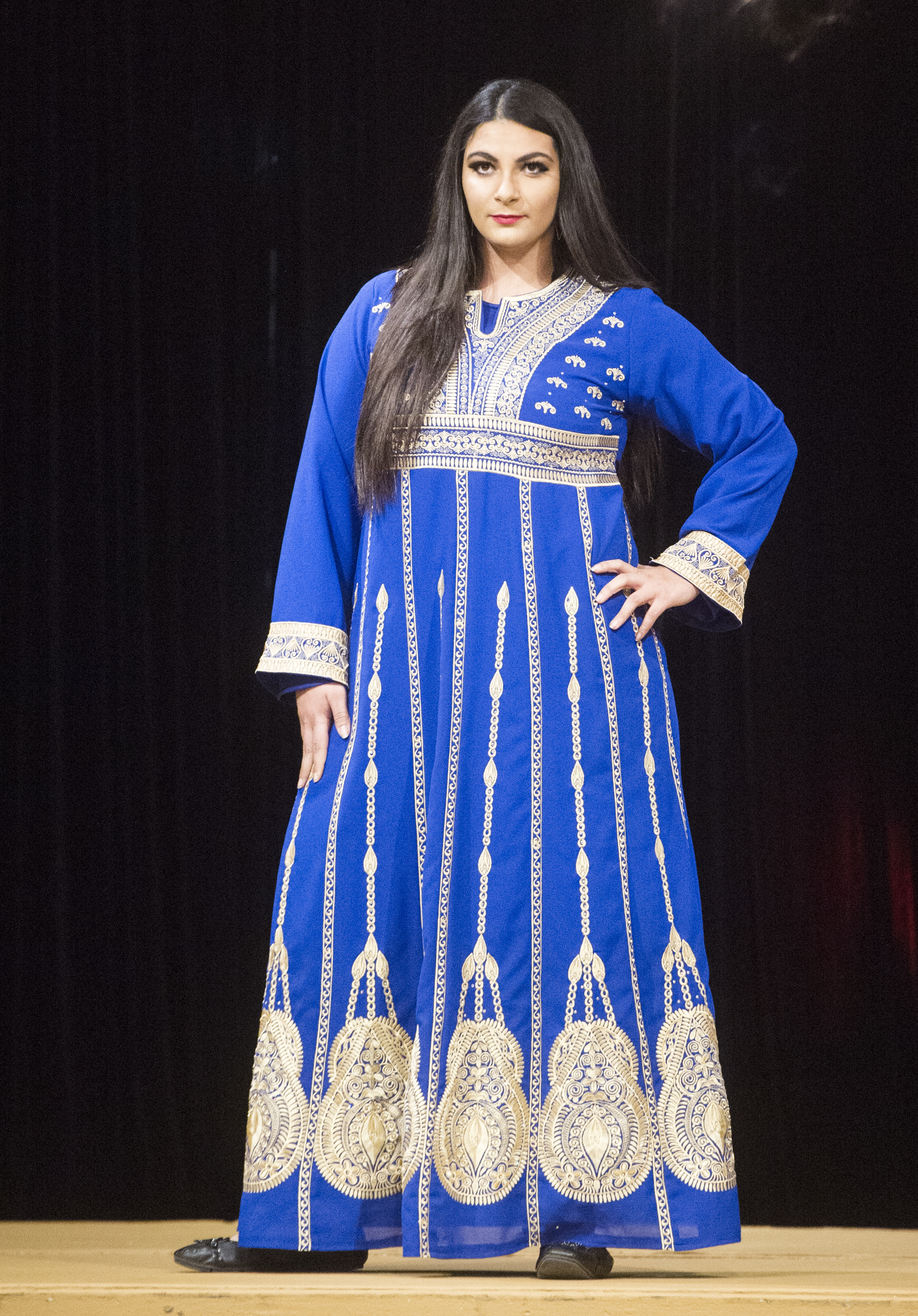 (Rick Egan | The Salt Lake Tribune) Noel Farr models an outfit from Egypt, at the 8th Annual Women of the World Fashion Show. The fashion show fund is raiser for the non-profit that seeks to help refugees settle in a new culture. Wednesday, March 7, 2018. 