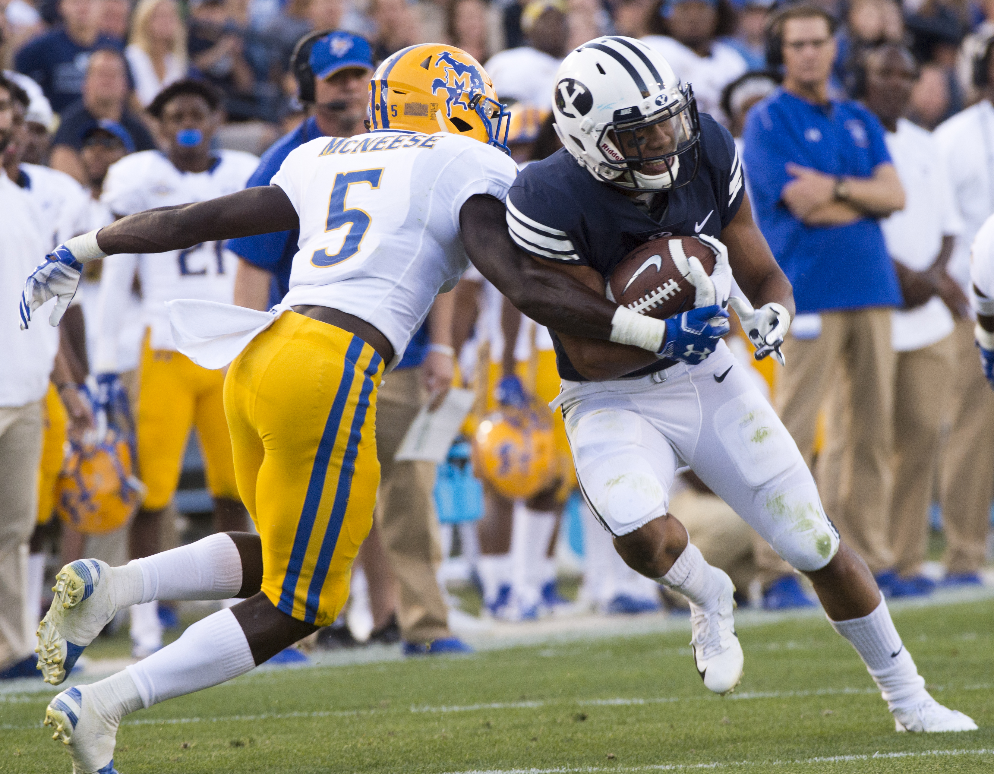 (Rick Egan | The Salt Lake Tribune) Brigham Young Cougars wide receiver Aleva Hifo (15) tries to get by McNeese State Cowboys defensive back Jovon Burriss (5), in football action Brigham Young Cougars vs McNeese State Cowboys at Lavell Edwards Stadium, Saturday, Sept. 22, 2018. 