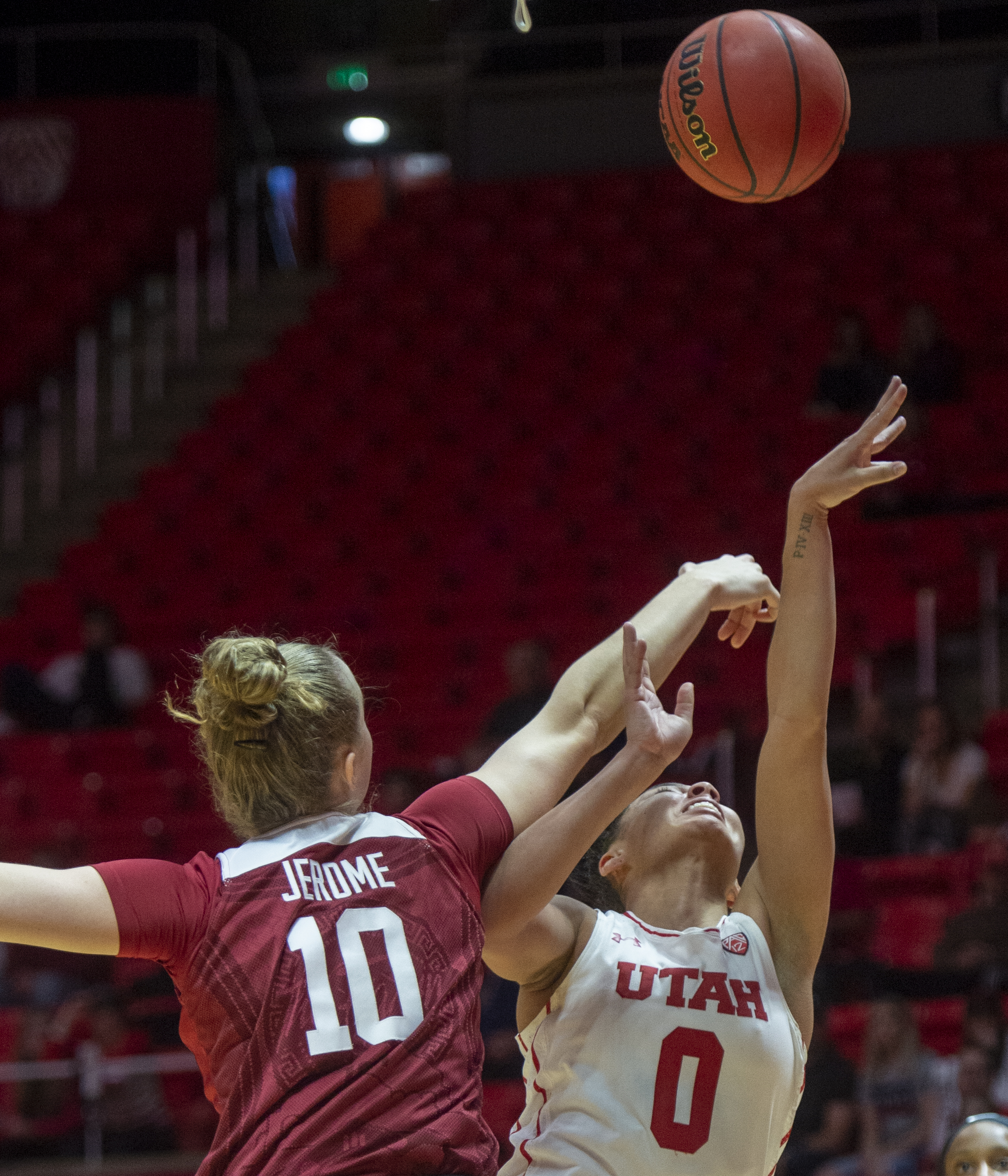 (Rick Egan | The Salt Lake Tribune) Utah Utes guard Kiana Moore (0) takes a shoot as Stanford Cardinal forward Alyssa Jerome (10) defends in PAC-12 action between the Utah Utes and the Stanford Cardinals at the Jon M. Huntsman Center. Sunday, Jan. 27, 2019. 