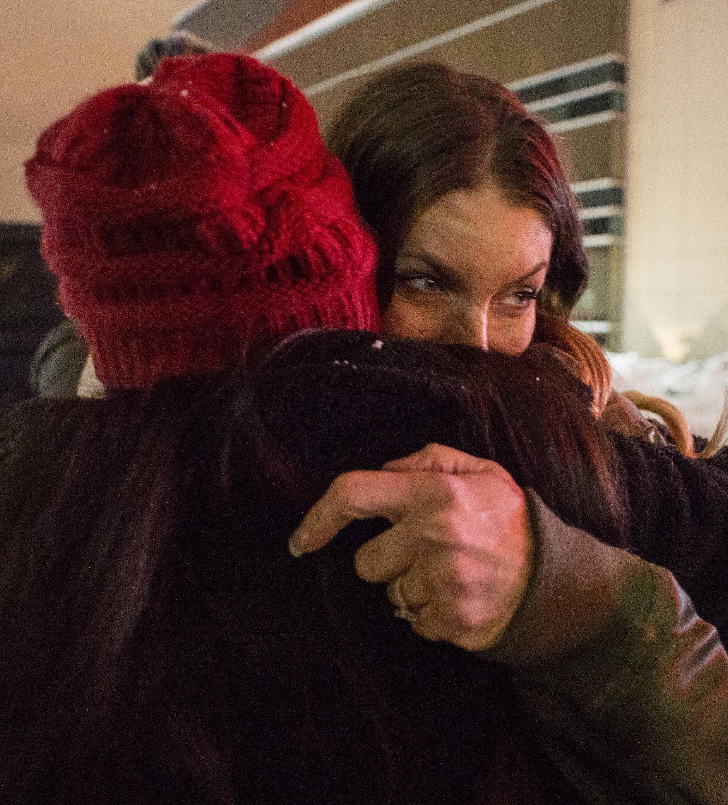 (Rick Egan | The Salt Lake Tribune) Nikki Stokoe the wife of David Stokoe, hugs a friend during a vigil for David Stokoe, a real estate agent killed at one of his rentals last week. Monday, Jan. 21, 2019.