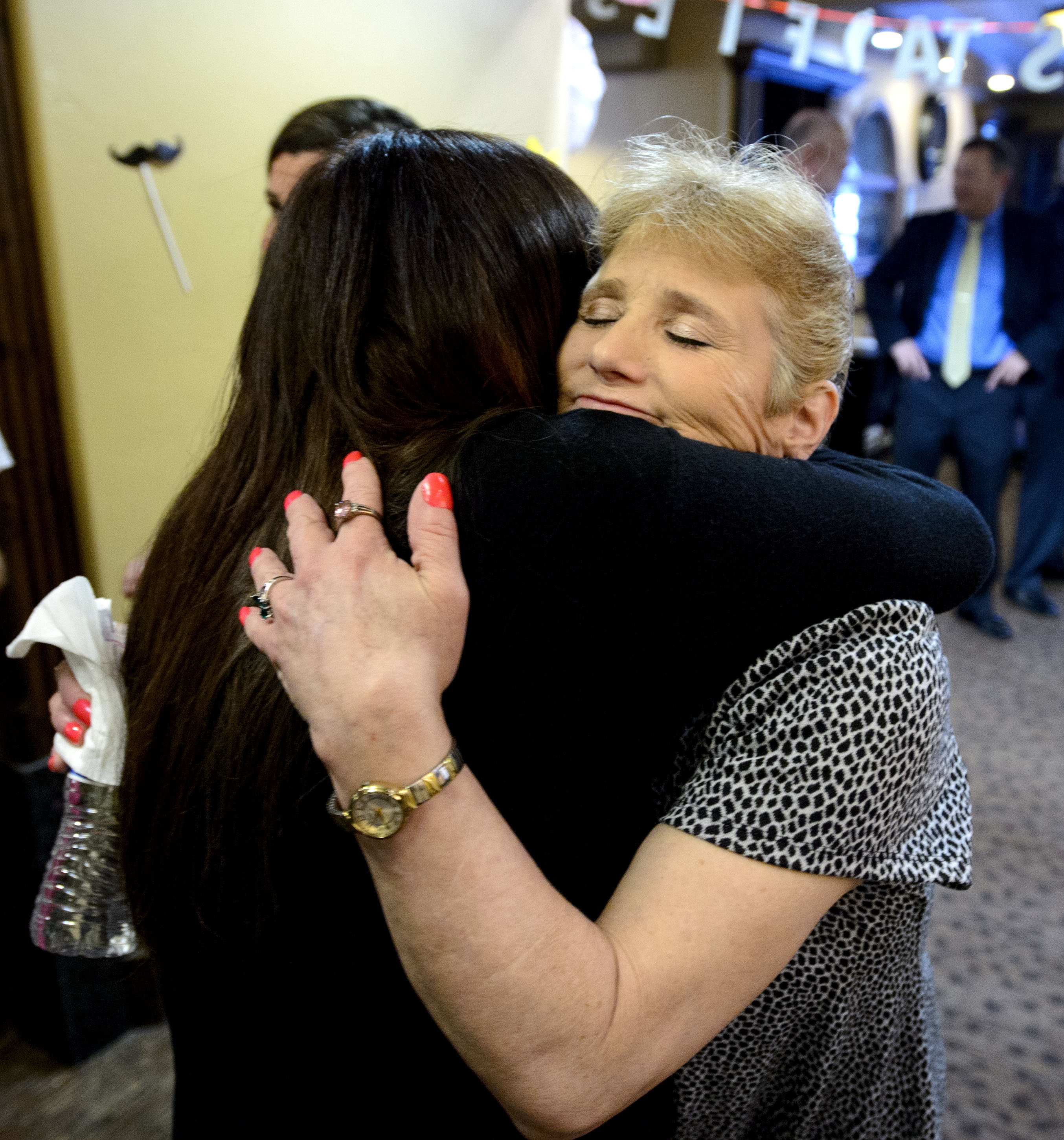 (Steve Griffin | The Salt Lake Tribune) INN Between resident Linda Lemieux, right, gets a hug from Janet Jackson, public relations volunteer for the Inn Between, following a news conference announcing a new home for INN Between, a hospice for the homeless facility in Salt Lake City. The INN Between will be moving into an existing assisted living facility on 1300 south near 1200 east where the news conference was held in Salt Lake City Thursday May 3, 2018.