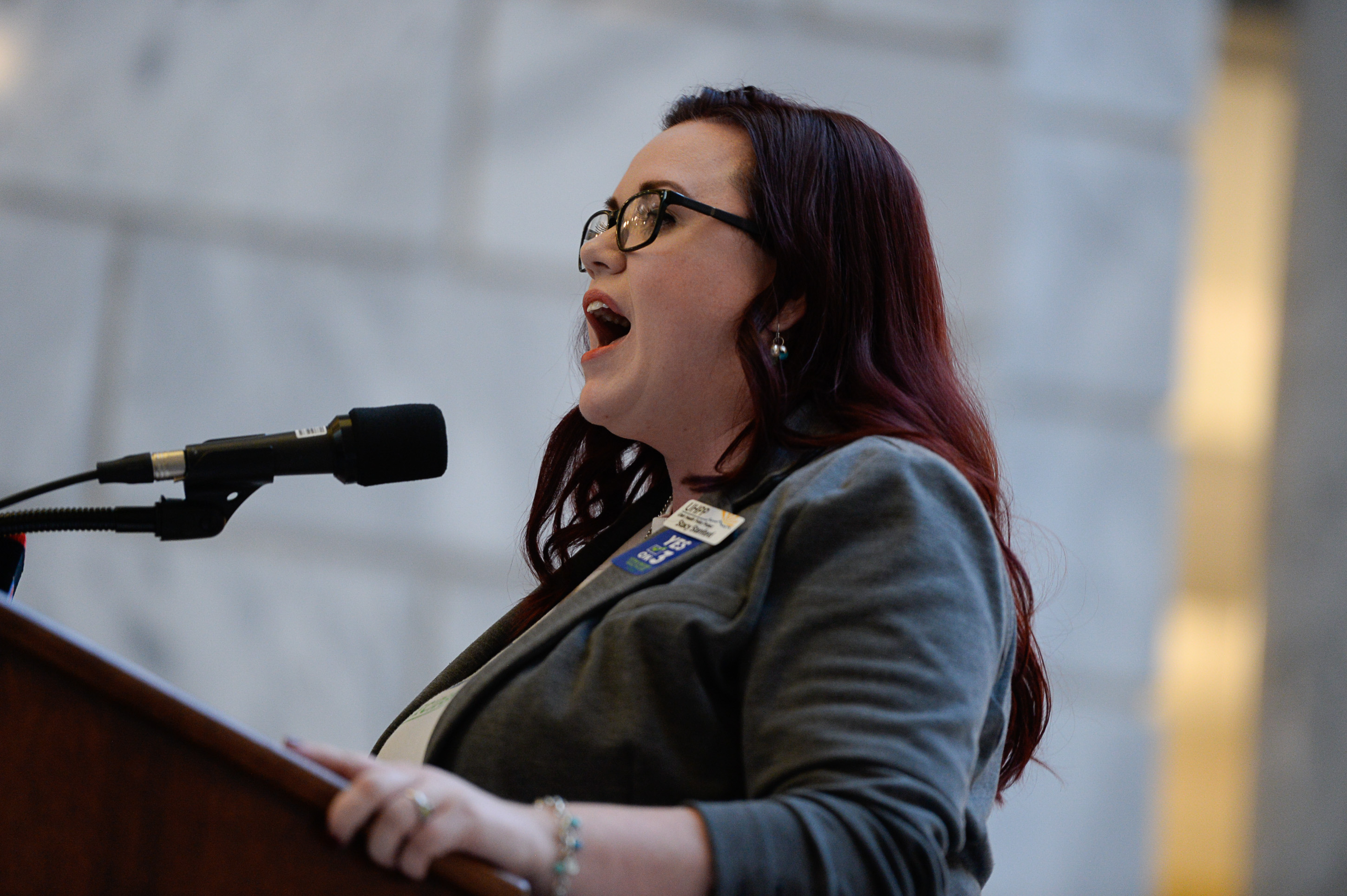 (Francisco Kjolseth | The Salt Lake Tribune) Stacy Stanford, policy analyst at Utah Health Policy Project who was formerly in the coverage gap rallies the crowd of demonstrators filling the Capitol rotunda on Monday, Jan, 28, 2019, on the first day of the Legislative session to rally in support of protecting Proposition 3, the Medicaid Expansion law recently passed by voters.