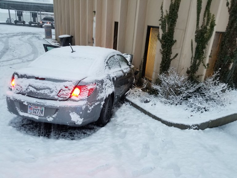 (Photo courtesy Unified Police Department) A 14-year-old lost control of this car and crashed into the side of the UPD station in Millcreek on Monday morning.