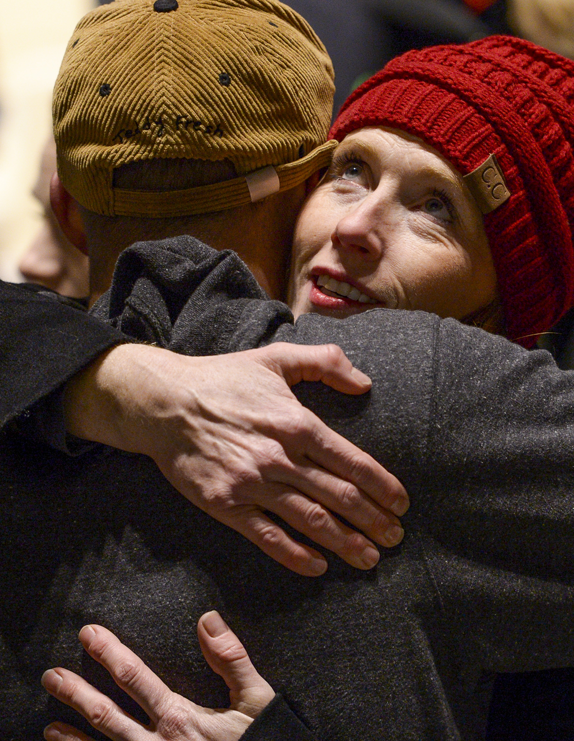 Leah Hogsten | The Salt Lake Tribune Jennie Taylor, wife of Army Major Brent Russell Taylor gets a hug from a family member after the ceremony, Sunday, Nov. 11, 2018. Veterans, family members of active and retired military and patriotic supporters celebrated Veteran's Day at the Barker Park amphitheater in North Ogden with a memorial for North Ogden's hometown hero Army Major Brent Russell Taylor, who was killed in action on November 3, 2018, while training an Afghan Army commando battalion in Afghanistan. 