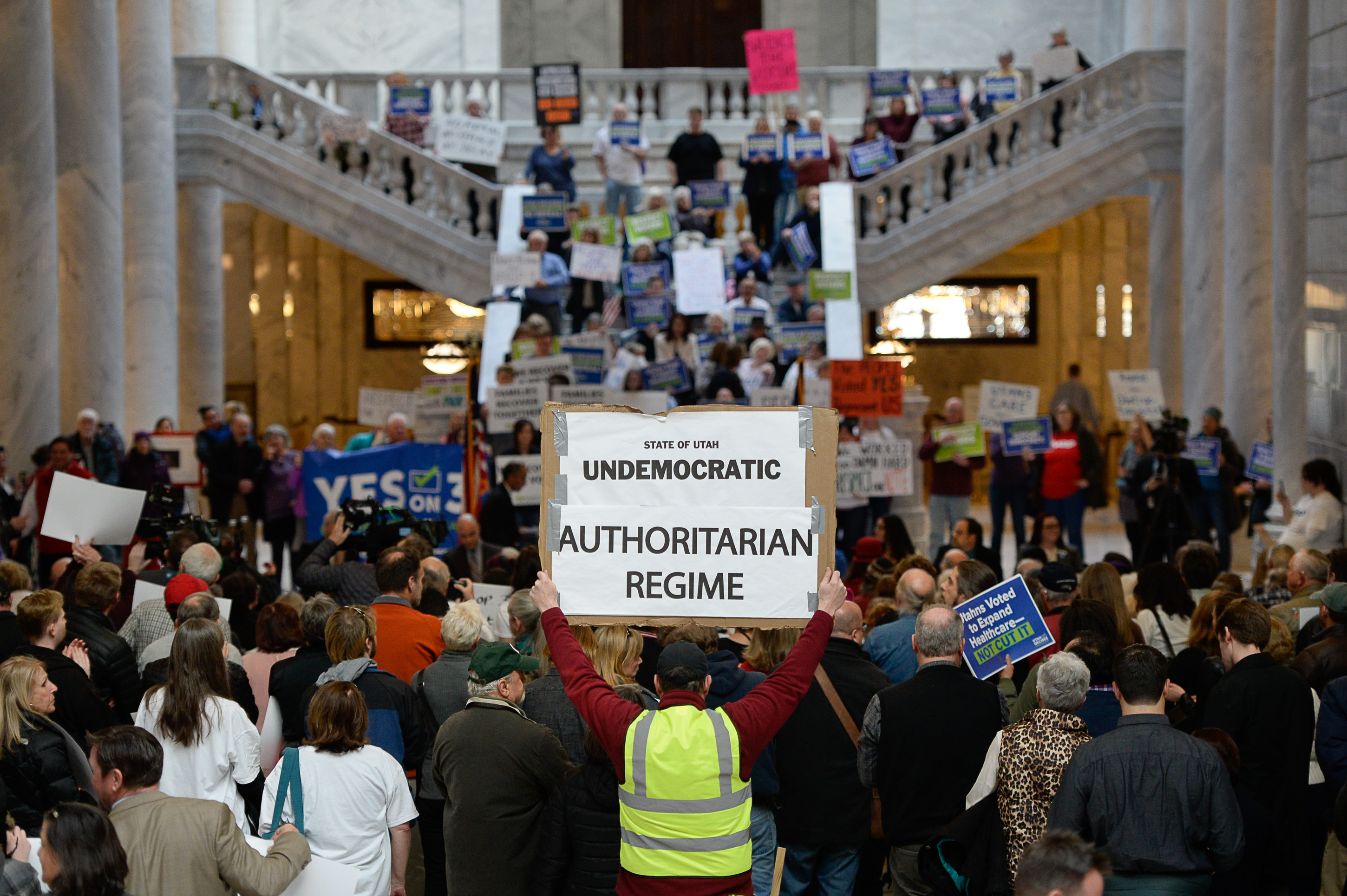 (Francisco Kjolseth | The Salt Lake Tribune) Over 300 demonstrators fill the Capitol rotunda on Monday, Jan, 28, 2019, on the first day of the Legislative session to rally in support of protecting Proposition 3, the Medicaid Expansion law recently passed by voters.