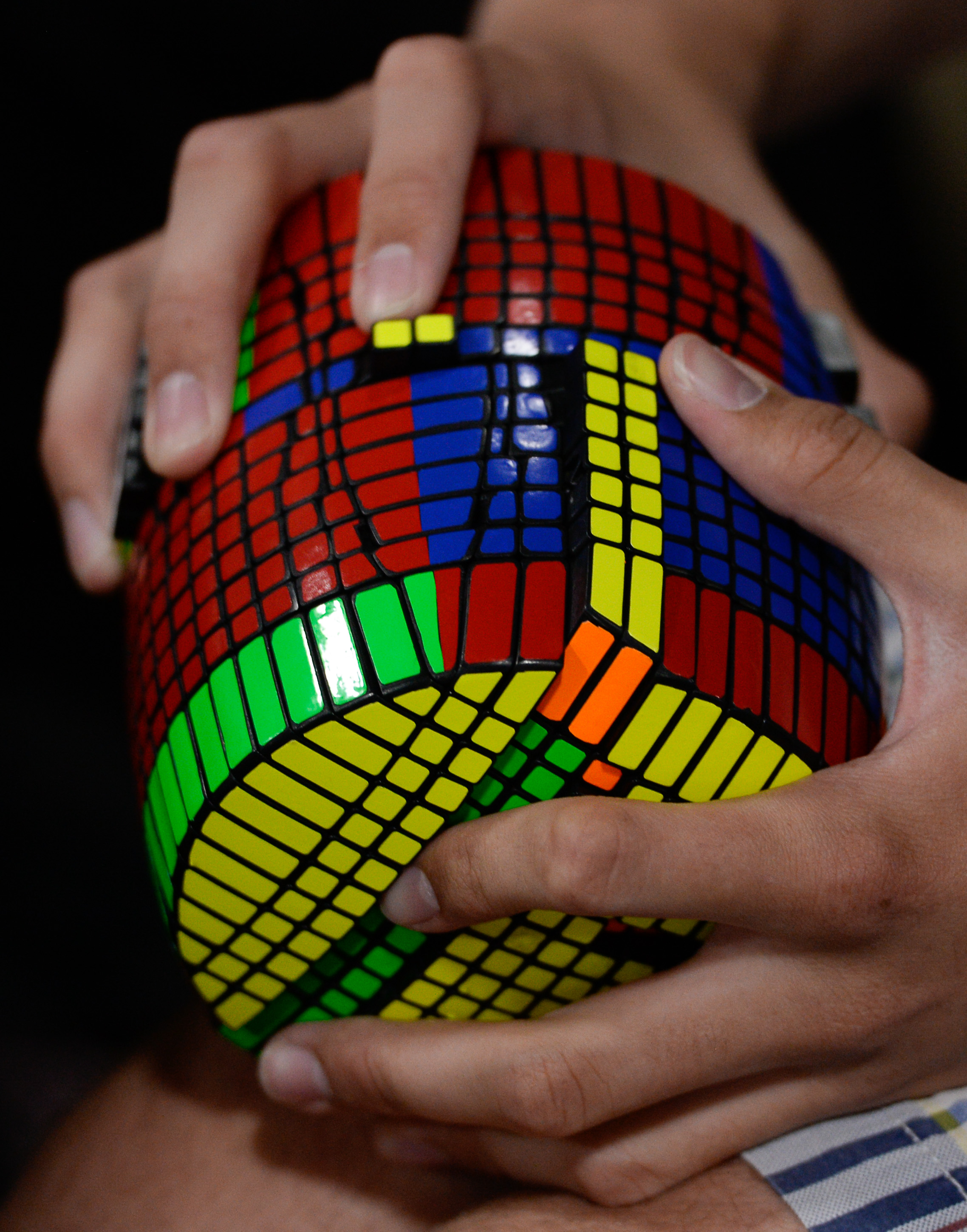 (Francisco Kjolseth | The Salt Lake Tribune) Damian Wilding, 19, of Idaho Falls works on his "one of a kind" 13x13 barrel that took him an entire summer to create using various tools as he attends CubingUSA Nationals 2018 at the Salt Palace Convention Center in Salt Lake City on Saturday, July 28, 2018. 