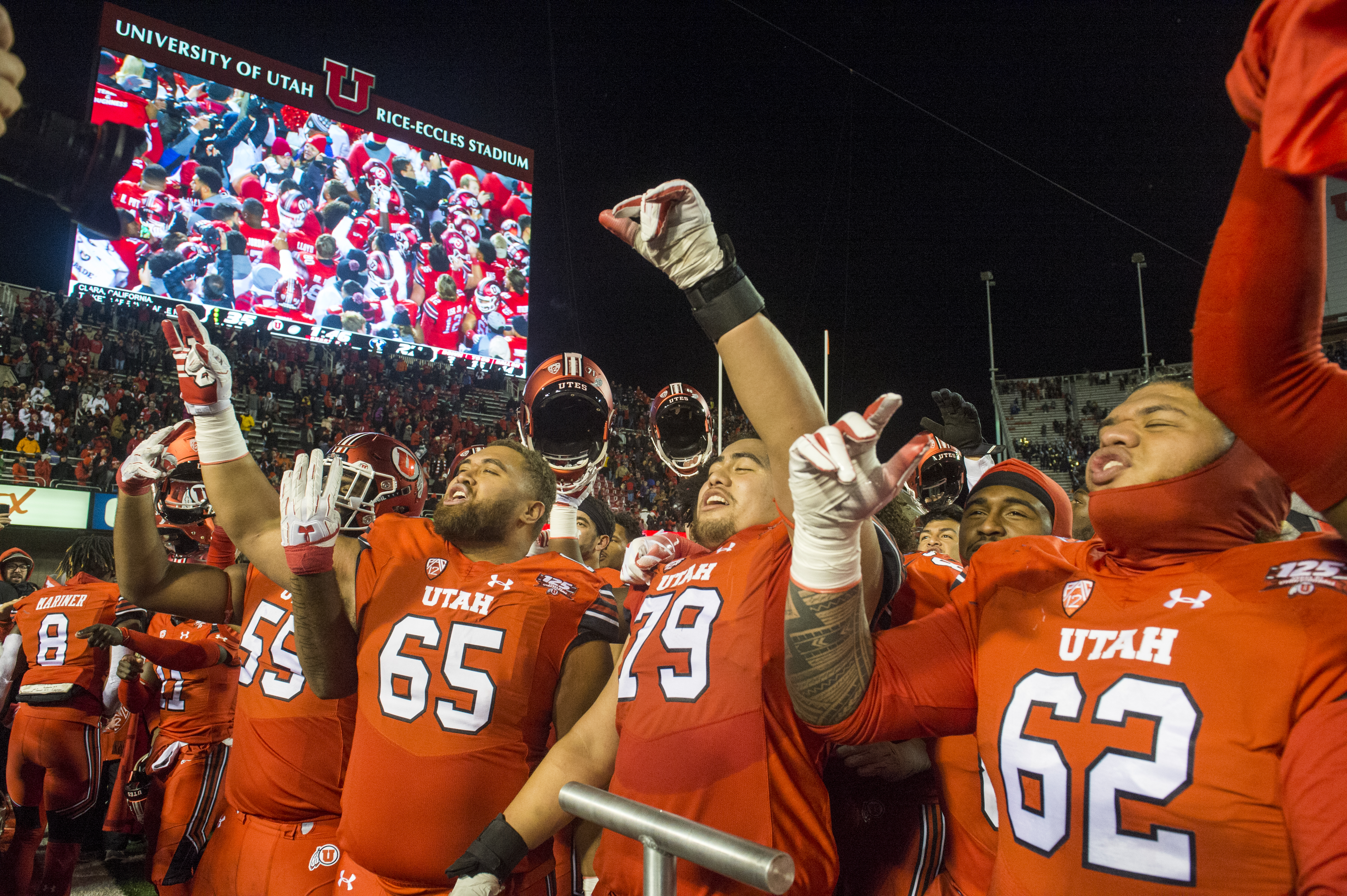 (Rick Egan | The Salt Lake Tribune) Utah Utes celebrate their 35-27, win over the Brigham Young Cougars, in football action between the Brigham Young Cougars and the Utah Utes, at Rice-Eccles Stadium, Saturday, November 24, 2018. 