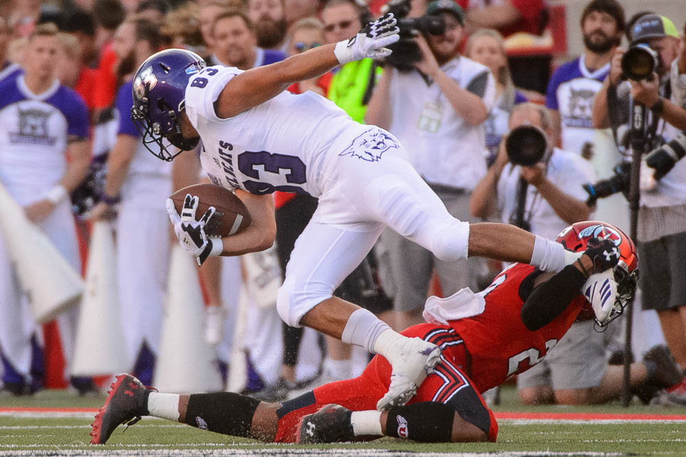 (Trent Nelson | The Salt Lake Tribune) Weber State Wildcats wide receiver David Ames (83) and Utah Utes defensive back Julian Blackmon (23) as the University of Utah Utes host the Weber State Wildcats, Thursday Aug. 30, 2018 at Rice-Eccles Stadium in Salt Lake City.