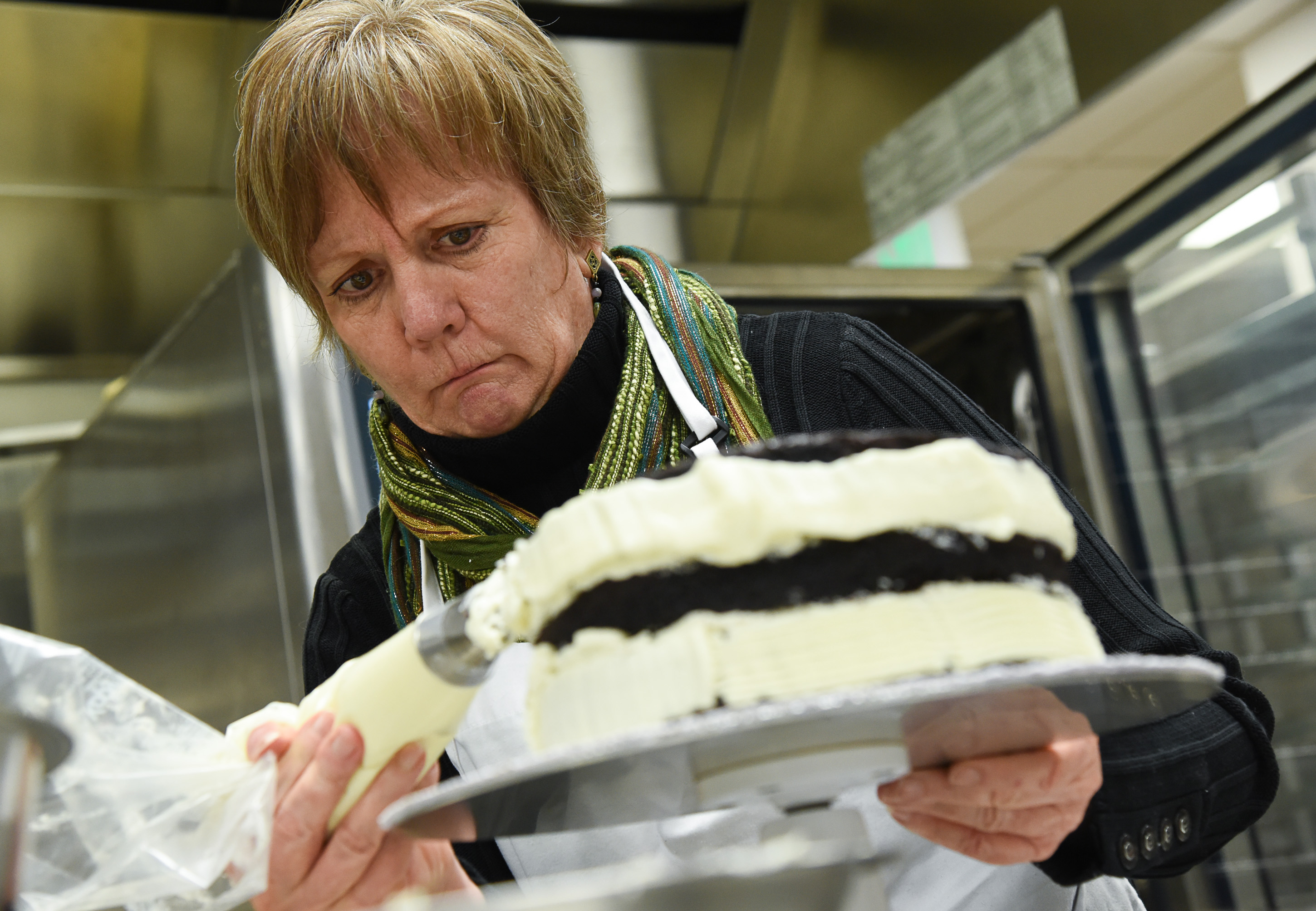 (Francisco Kjolseth | The Salt Lake Tribune) Learning a new craft, actress Betsy West prepares for an upcoming role of a Southern Baptist bakery owner in North Carolina faced with a request to bake a cake for a gay couple getting married for Salt Lake Acting Company's production of "The Cake." A self admitted baking novice, West, in search of better authenticity in portraying her role received a one-on-one lesson from the chef's at Flourish.