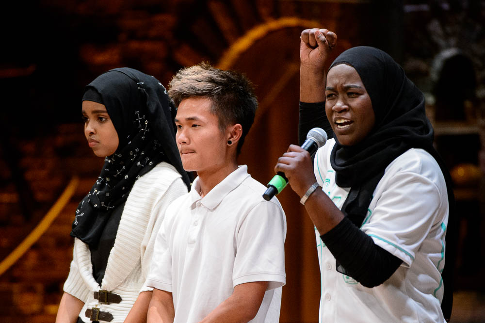 (Trent Nelson | The Salt Lake Tribune) Students in the Hamilton Education Project, or EduHam, perform for the cast of "Hamilton," at the Eccles Theater in Salt Lake City, Friday May 4, 2018. ZamZam Ahmed (left), Klo Plah Hset (center) and Ramla Osman of Utah International Charter School.