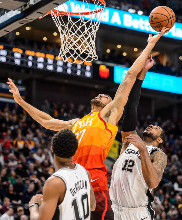 (Trent Nelson | The Salt Lake Tribune) Utah Jazz center Rudy Gobert (27) and San Antonio Spurs center LaMarcus Aldridge (12) rebound as the Utah Jazz host the San Antonio Spurs, NBA basketball in Salt Lake City on Saturday Feb. 9, 2019.