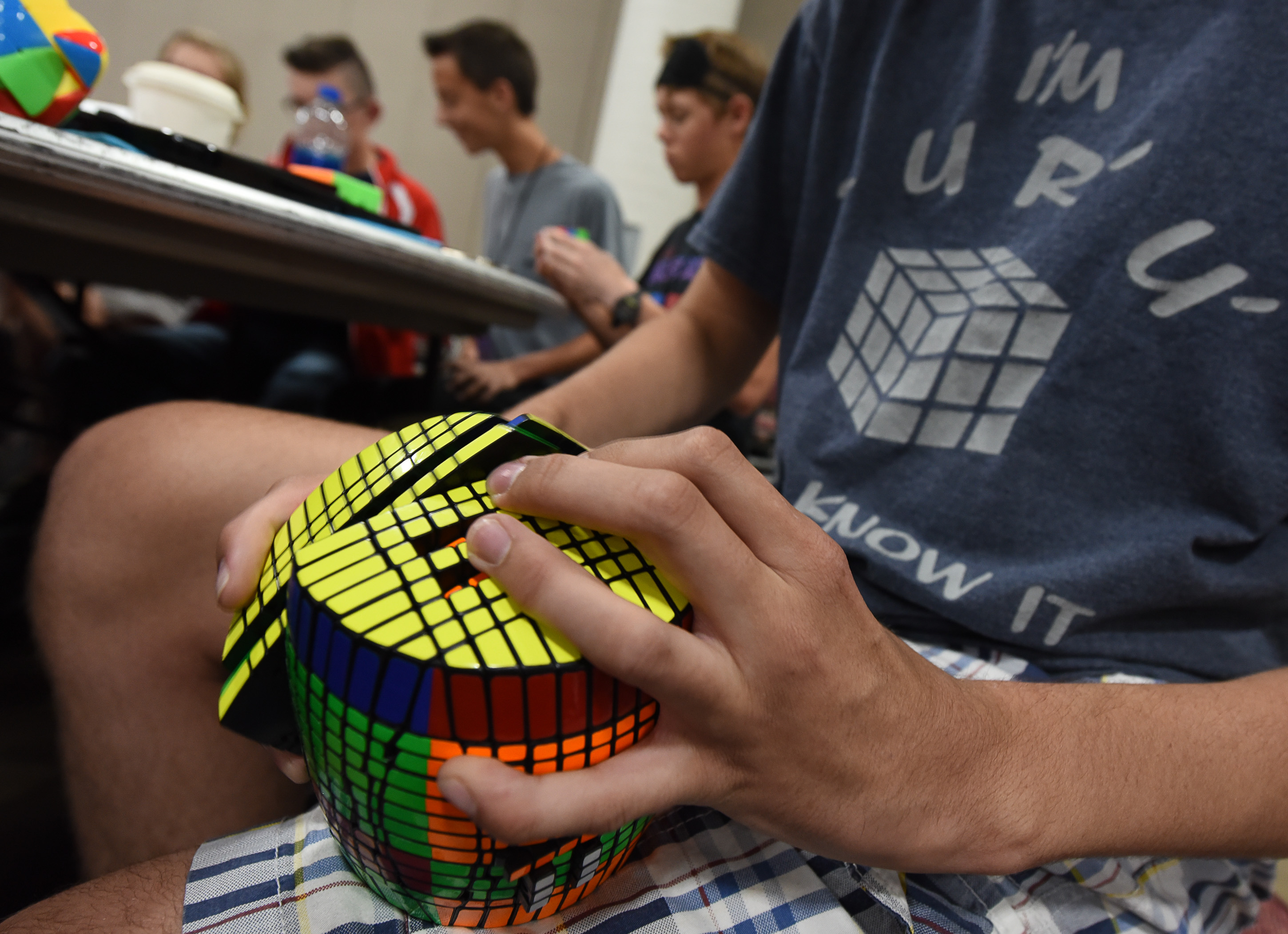(Francisco Kjolseth | The Salt Lake Tribune) Damian Wilding, 19, of Idaho Falls works on his "one of a kind" 13x13 barrel that took him an entire summer to create using various tools as he attends CubingUSA Nationals 2018 at the Salt Palace Convention Center in Salt Lake City on Saturday, July 28, 2018.