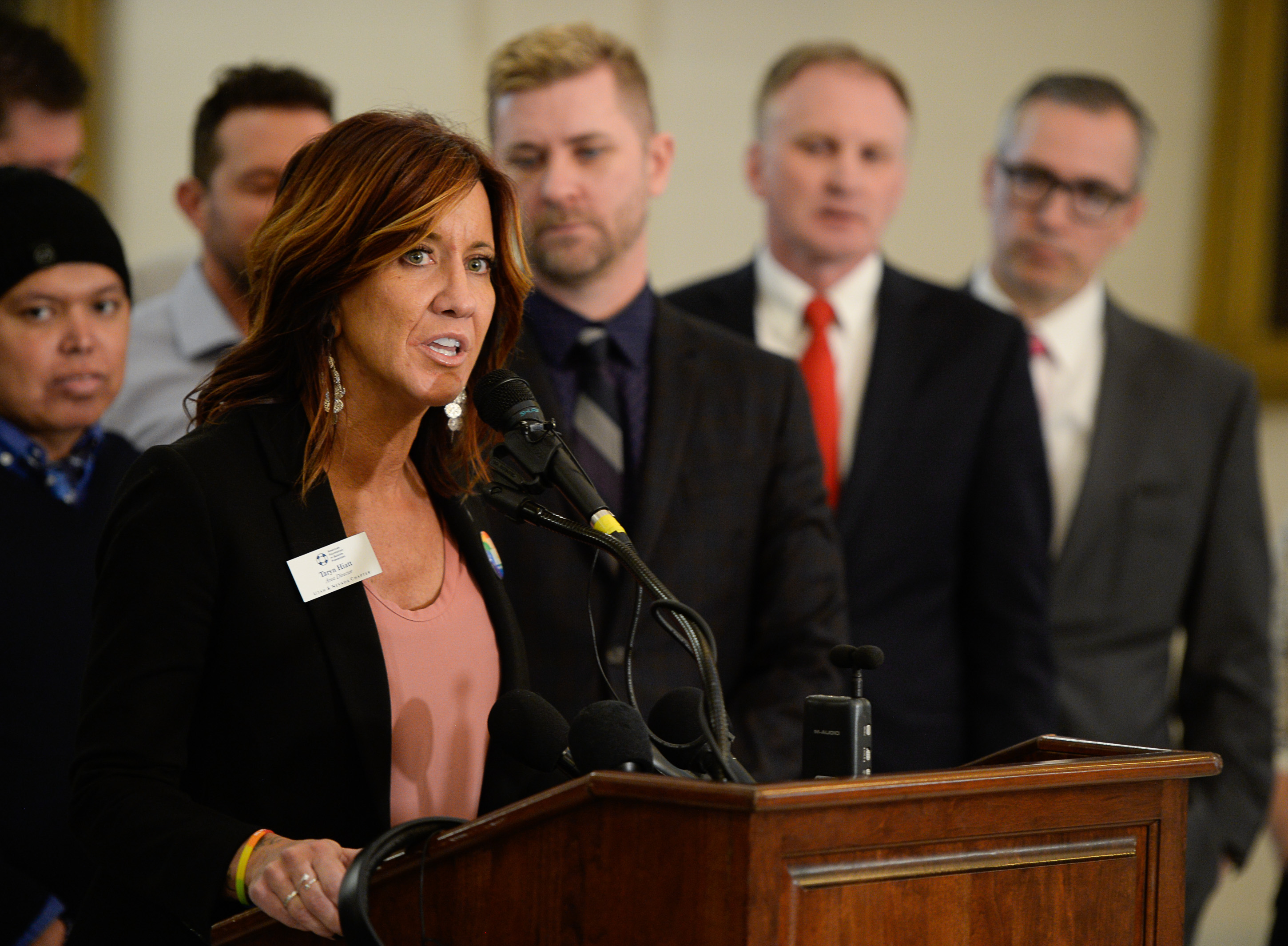 (Francisco Kjolseth | The Salt Lake Tribune) Taryn Hiatt with the American Foundation for Suicide Prevention lends her voice during a press event at the Utah capitol as Craig Hall, R-West Valley, and Sen. Dan McCay, R-Riverton, introduce legislation to ban conversion therapy.