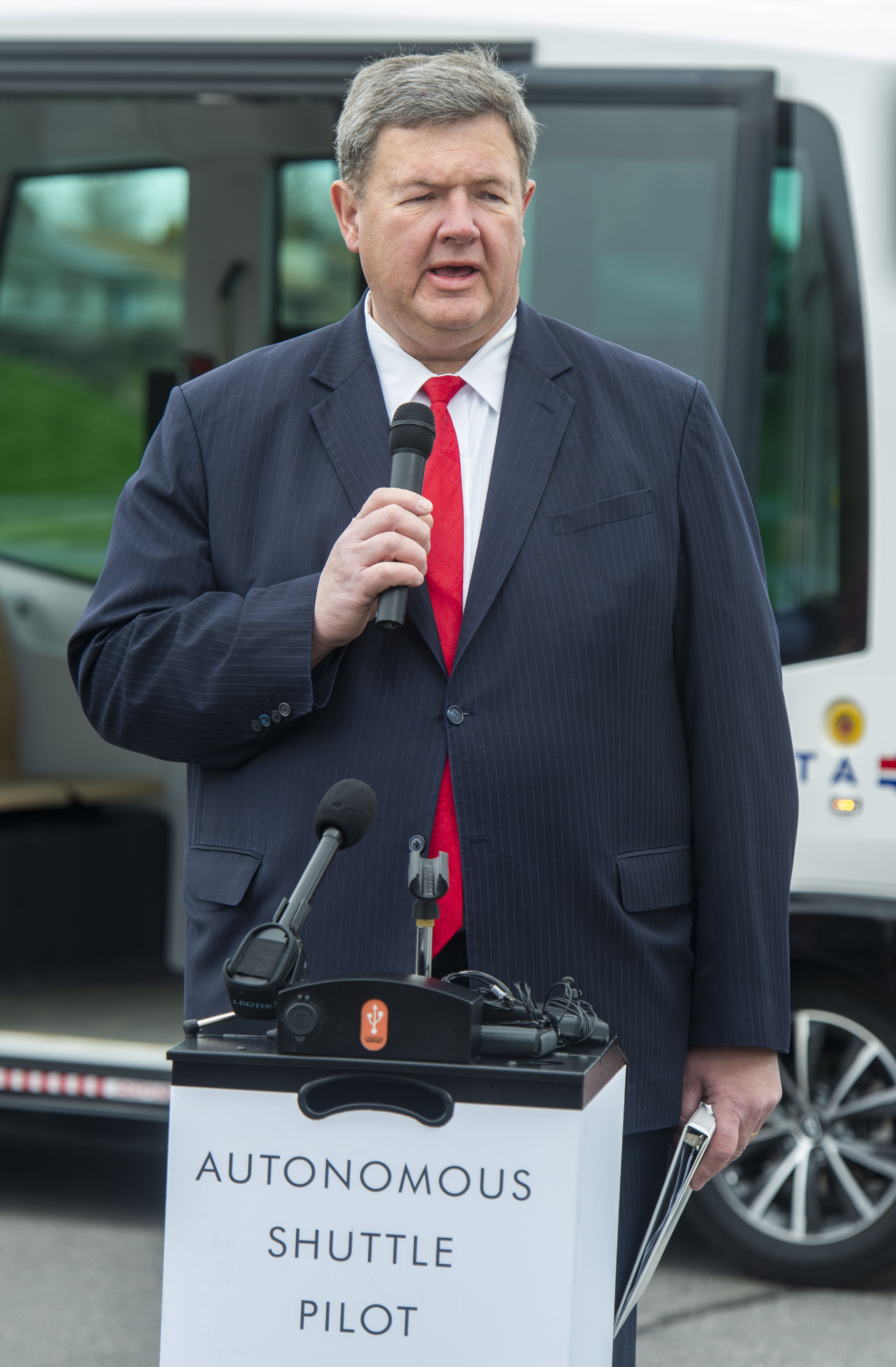 (Rick Egan | The Salt Lake Tribune) UTA Board Chair Carlton Christensen Talks about the Autonomous Shuttle, at the test track is across the street from UDOT headquarters on the west side of 2700 West. Thursday, April 11, 2019. 