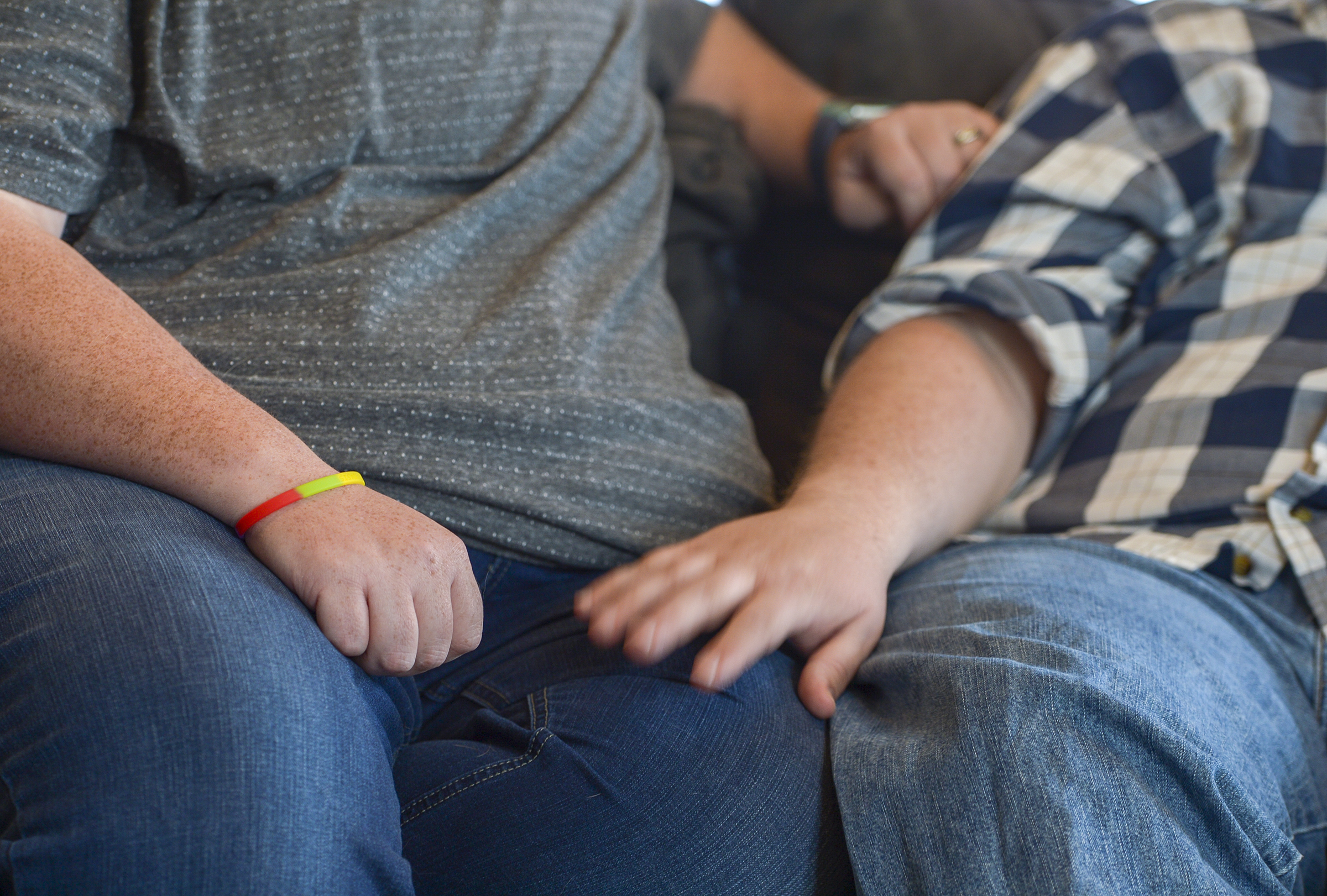 (Leah Hogsten | The Salt Lake Tribune) After a lifetime of feeling like they were born into the wrong body, Kris Irvin came out as transgender three years ago at the age of 28. Nate Irvin taps Kris' knee while they discuss Kris' body dysphoria and their desires for top surgery to remove Kris' breasts. The two are devout members of the LDS Church, but the Irvin's local bishop has said that he considers it against policy and grounds for discipline.