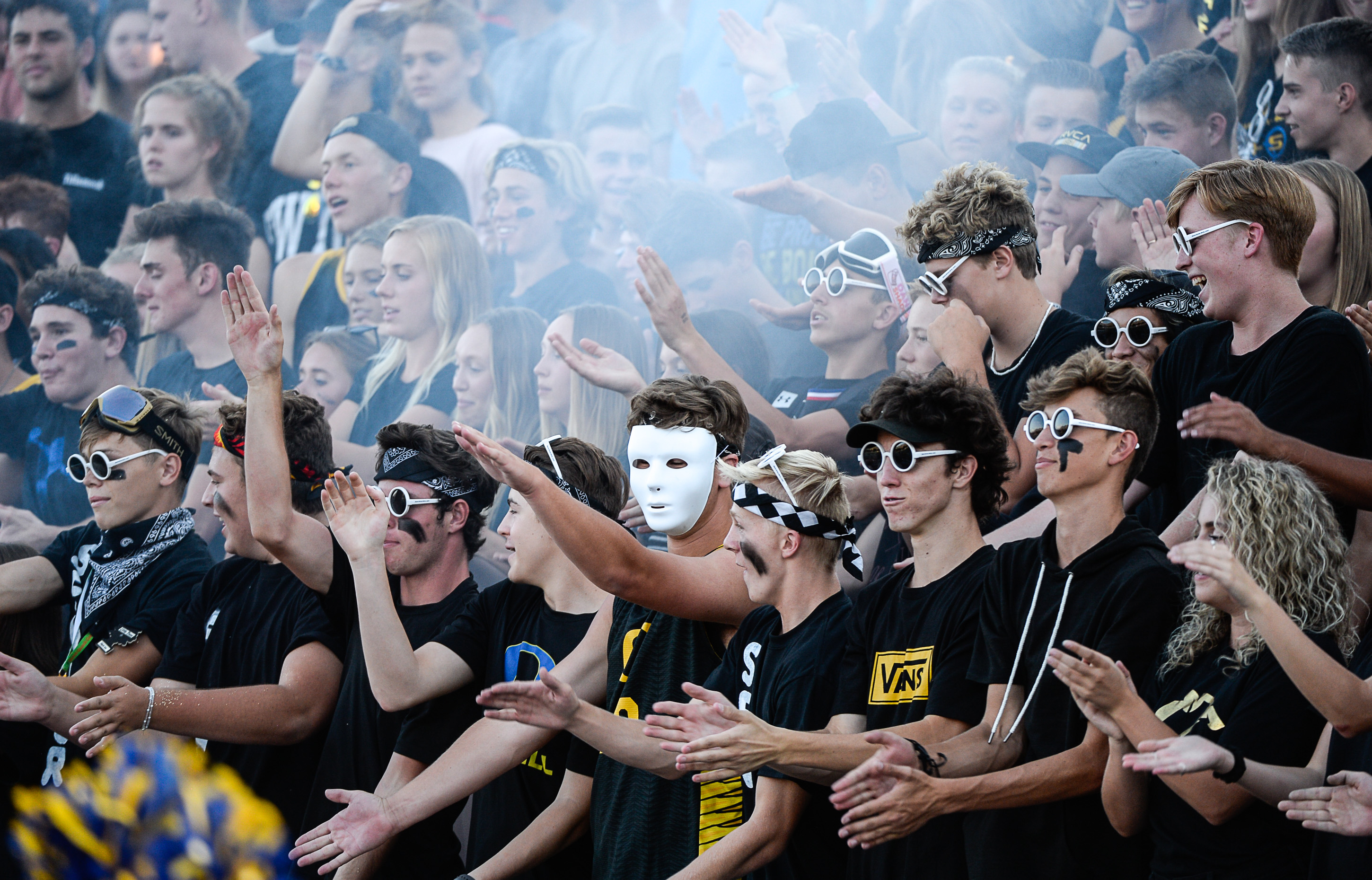 (Francisco Kjolseth | The Salt Lake Tribune) The Orem fans cheer on their team as they host Bingham for the start of the football season, Thursday, Aug. 16, 2018.