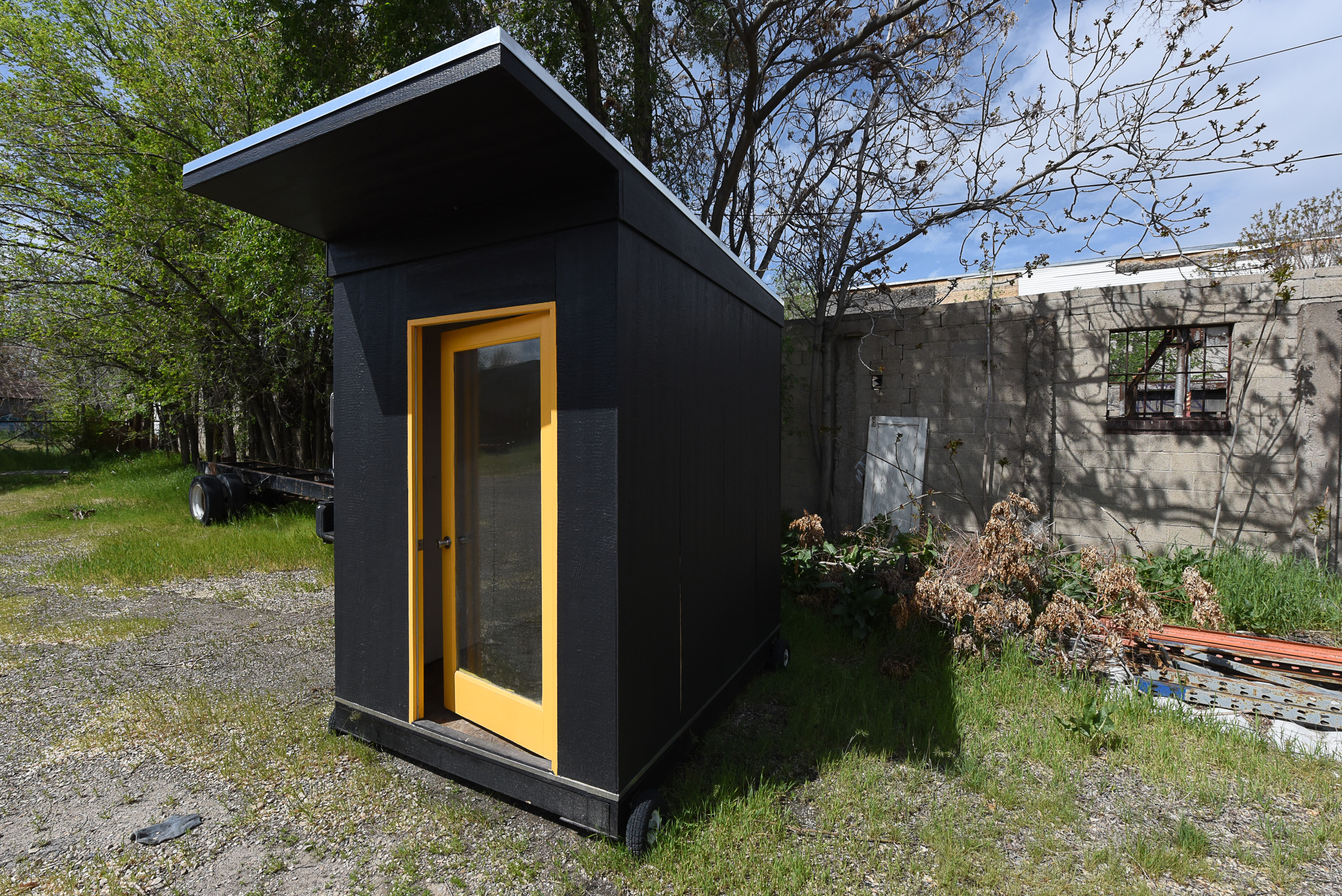 (Francisco Kjolseth | The Salt Lake Tribune) One of the first tiny house prototypes built by Jeff White was designed as a movable shelter that would simply provide a dry, safe place for a homeless person to live. Fast forward many years later and Our Homes, Our Voices, a campaign to bring more attention to the affordable housing crisis across the country showcases a new solutions being presented by small house specialist Jeff White in Sat Lake City on Wed. May 2, 2018. 