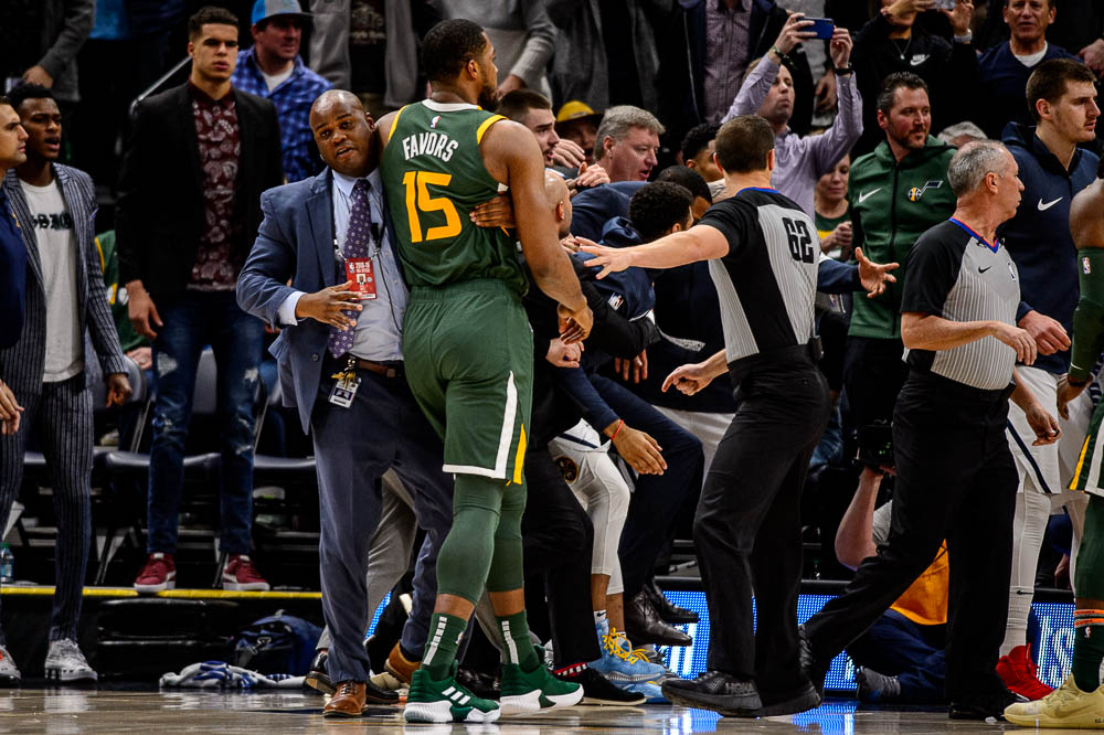 (Trent Nelson | The Salt Lake Tribune) Utah Jazz forward Derrick Favors (15) is pushed away from a scuffle as the Utah Jazz host the Denver Nuggets, NBA basketball in Salt Lake City on Wednesday Jan. 23, 2019.