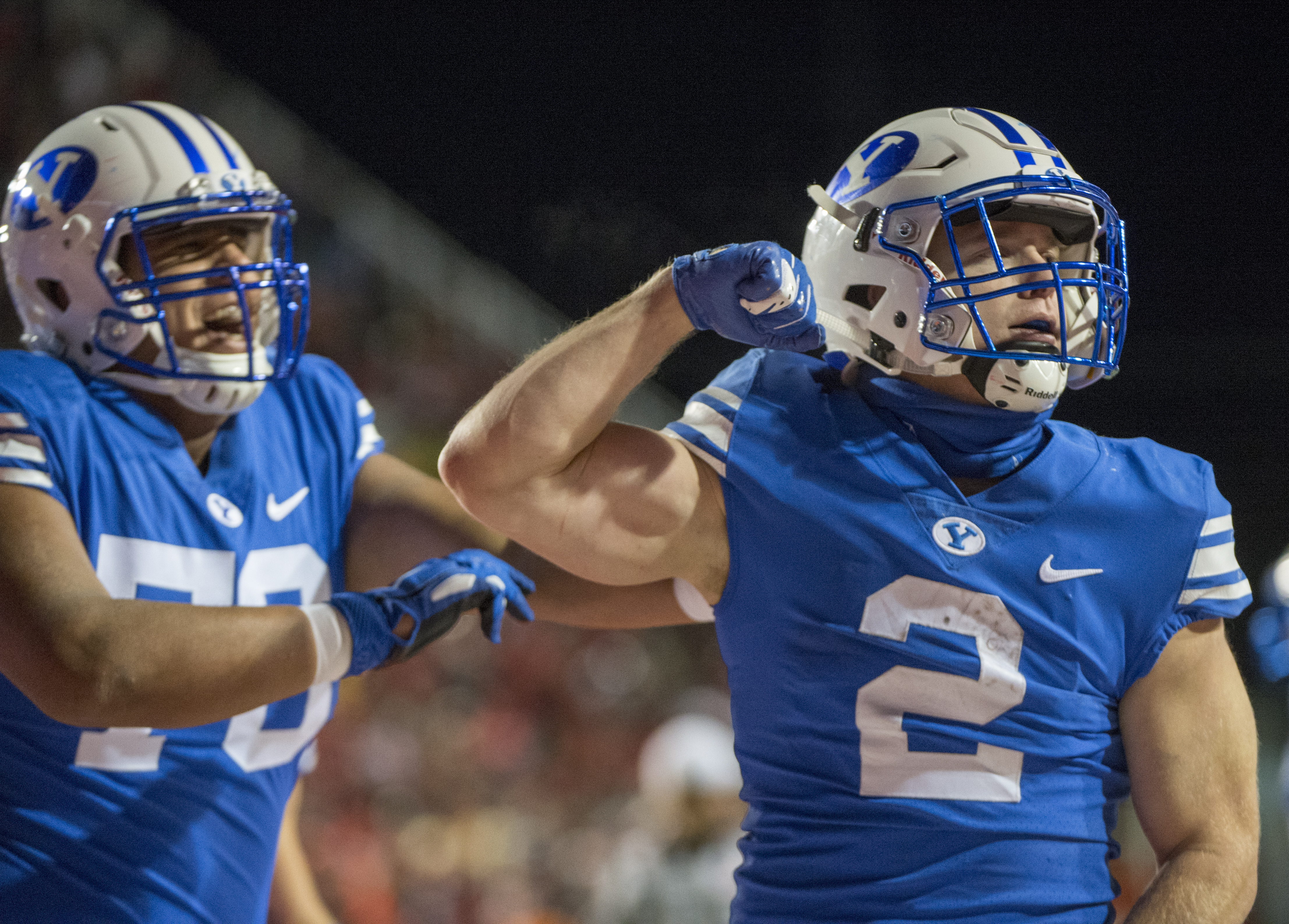 (Rick Egan | The Salt Lake Tribune) Brigham Young Cougars offensive lineman Jacob Jimenez (70) celebrates as Brigham Young running back Matt Hadley (2) scores a touchdown for the Cougars, in football action between the Brigham Young Cougars and the Utah Utes, at Rice-Eccles Stadium, Saturday, November 24, 2018. 