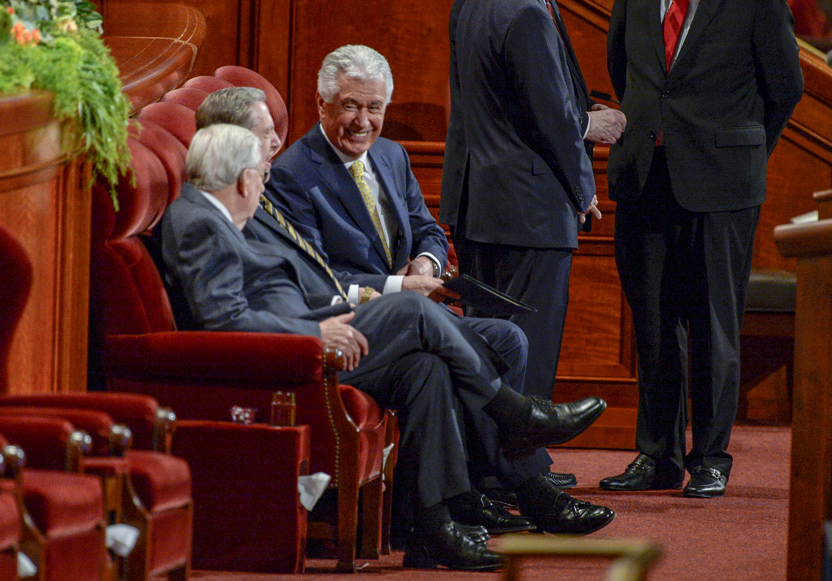 (Leah Hogsten | The Salt Lake Tribune) l-r President M. Russell Ballard, Elder Jeffrey R. Holland and Elder Dieter F. Uchtdorf greet one another during 189th Annual General Conference of The Church of Jesus Christ of Latter-day Saints in Salt Lake City.
