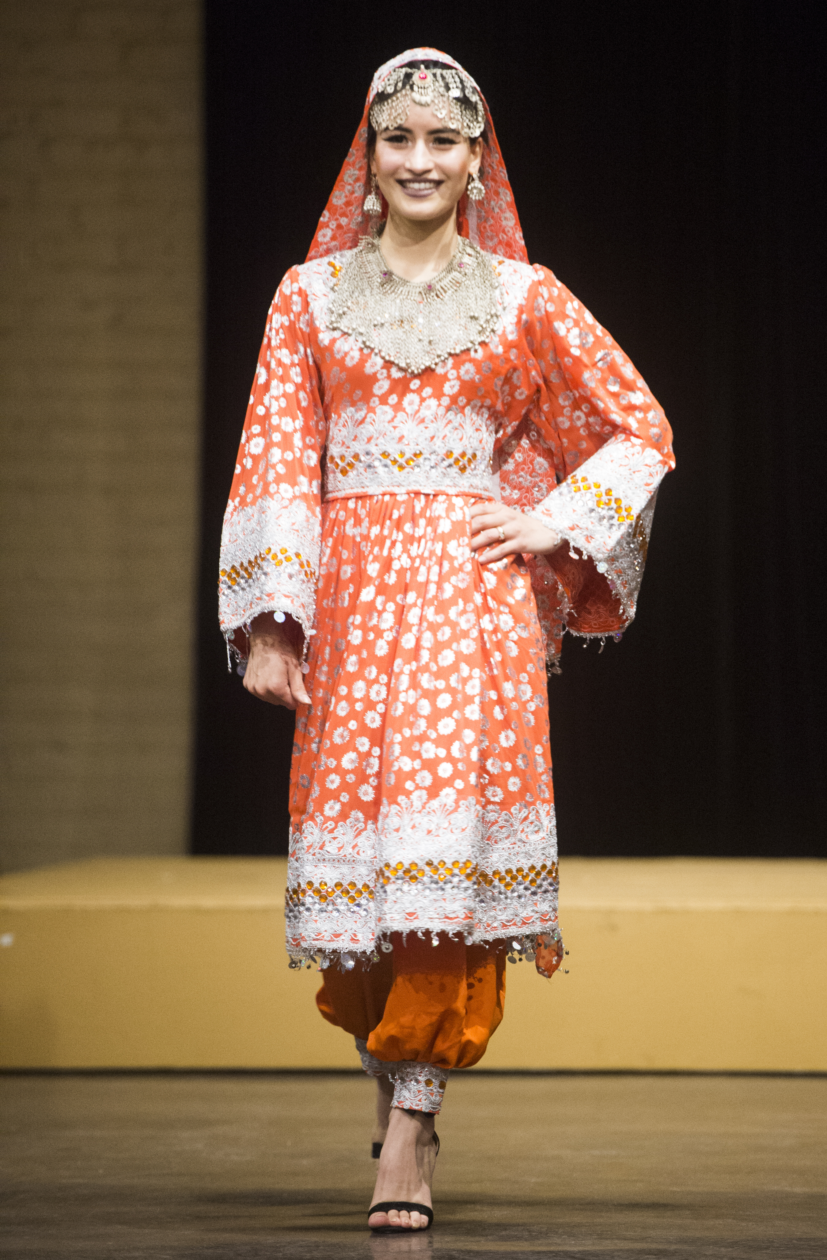 (Rick Egan | The Salt Lake Tribune) Marzyie Barati, Afganistan, walks the runway, at the 8th Annual Women of the World Fashion Show. The fashion show fund is raiser for the non-profit that seeks to help refugees settle in a new culture. Wednesday, March 7, 2018. 