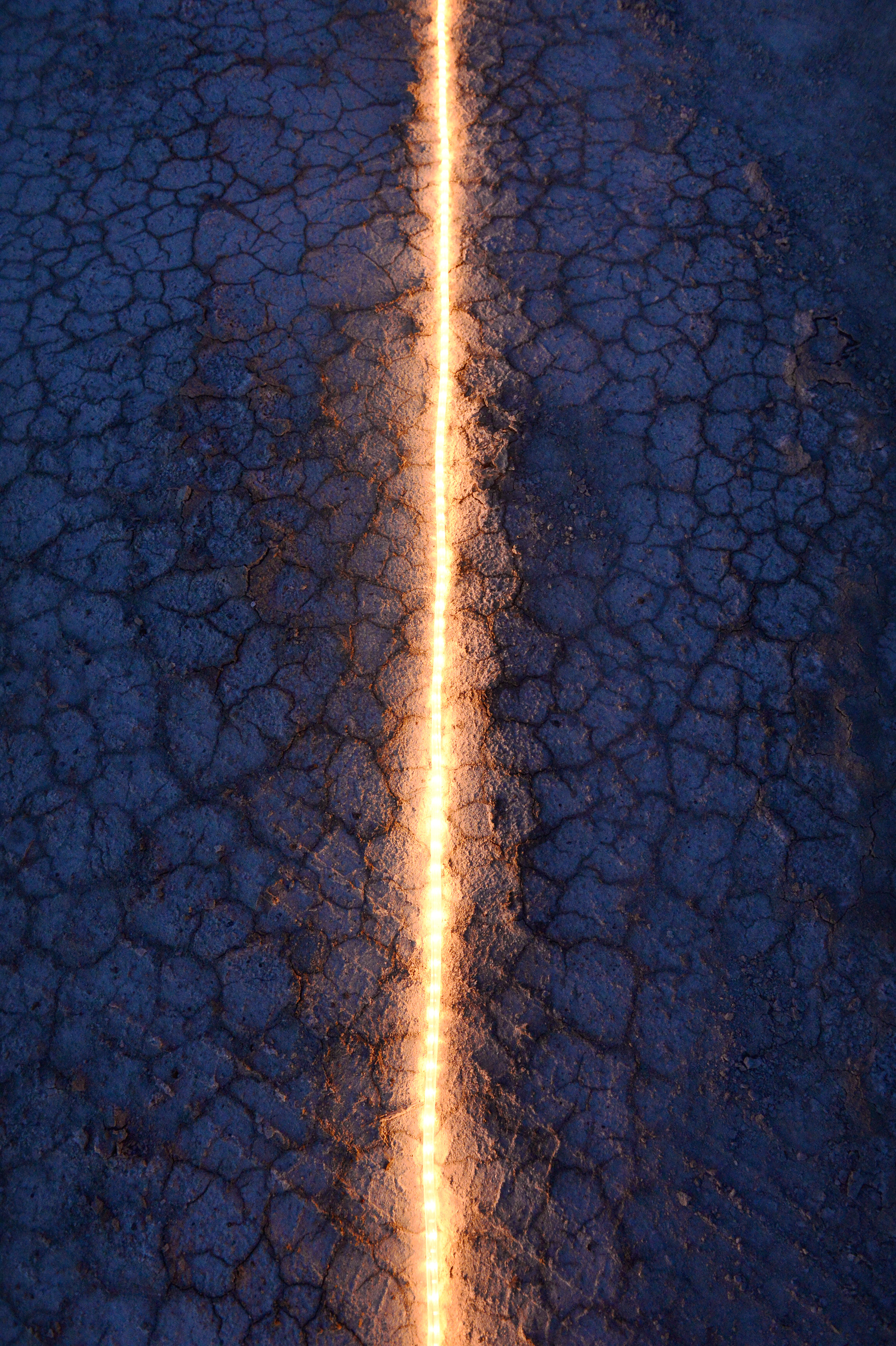 (Scott Sommerdorf | The Salt Lake Tribune) A light strip on the salt flats lit the way to Aid Station 14 - the last checkpoint before the finish line at the Salt Flats 100 Endurance Run, Saturday, May 5, 2018. 