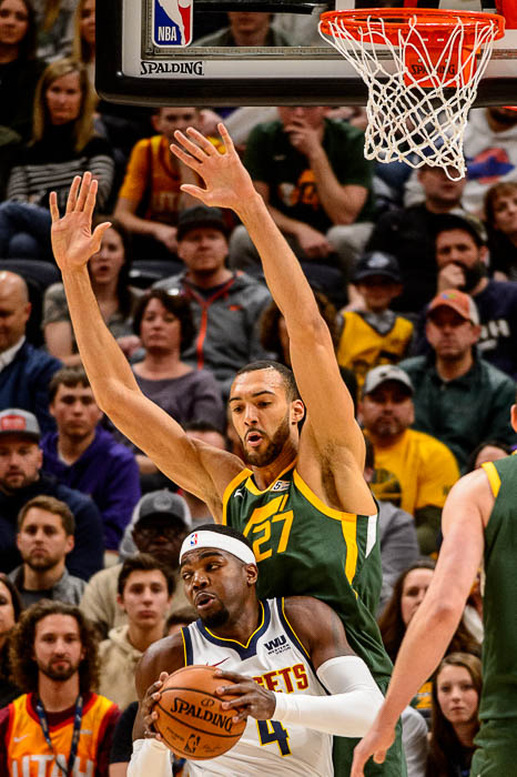 (Trent Nelson | The Salt Lake Tribune) Utah Jazz center Rudy Gobert (27) defending Denver Nuggets forward Paul Millsap (4) as the Utah Jazz host the Denver Nuggets, NBA basketball in Salt Lake City on Wednesday Jan. 23, 2019.