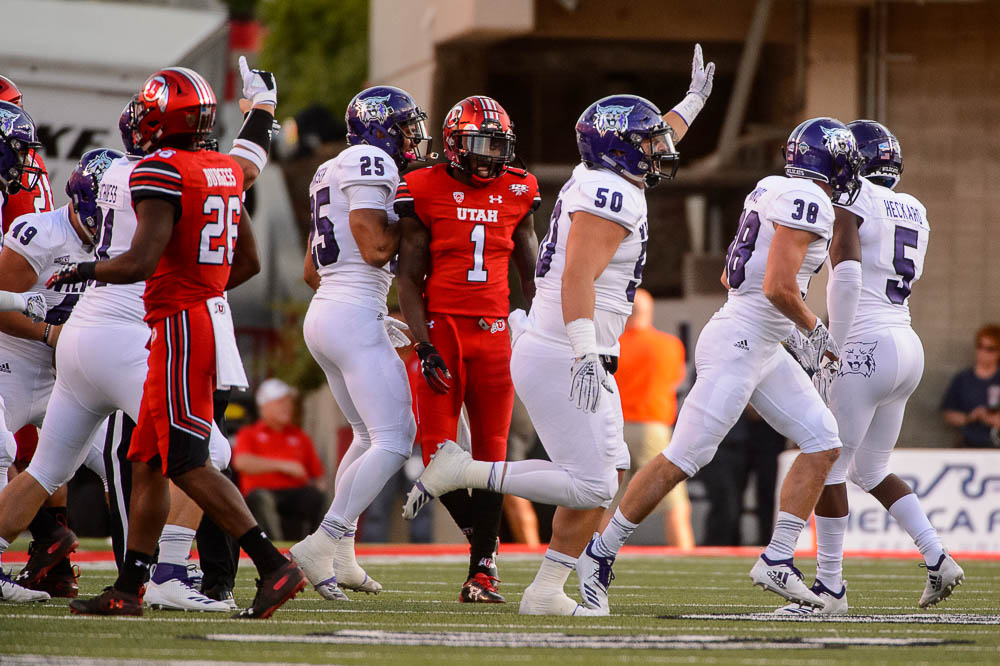 (Trent Nelson | The Salt Lake Tribune) Weber players celebrate a turnover as the University of Utah Utes host the Weber State Wildcats, Thursday Aug. 30, 2018 at Rice-Eccles Stadium in Salt Lake City.