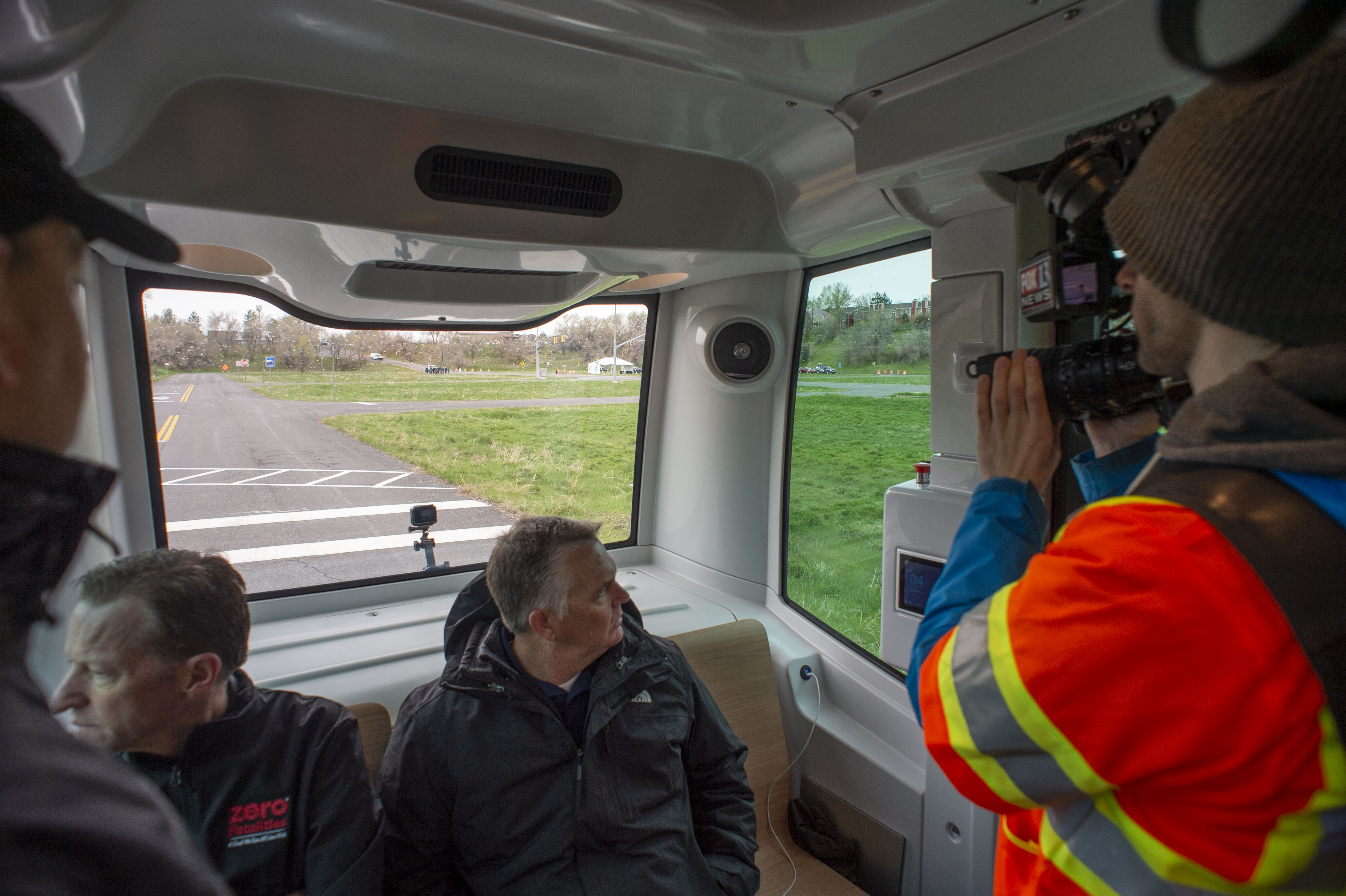 (Rick Egan | The Salt Lake Tribune) Media members take a ride on the Autonomous Shuttle for a test drive, at the test track is across the street from UDOT headquarters on the west side of 2700 West. Thursday, April 11, 2019. 