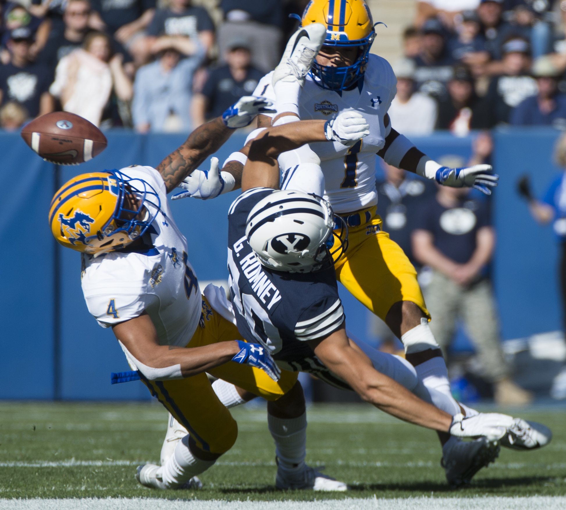 (Rick Egan | The Salt Lake Tribune) McNeese State Cowboys defensive back Colby Burton (4) deflects a pass intended for Brigham Young Cougars wide receiver Gunner Romney (80), in football action between Brigham Young Cougars and McNeese State Cowboys, at Lavell Edwards Stadium, Saturday, Sept. 22, 2018. 