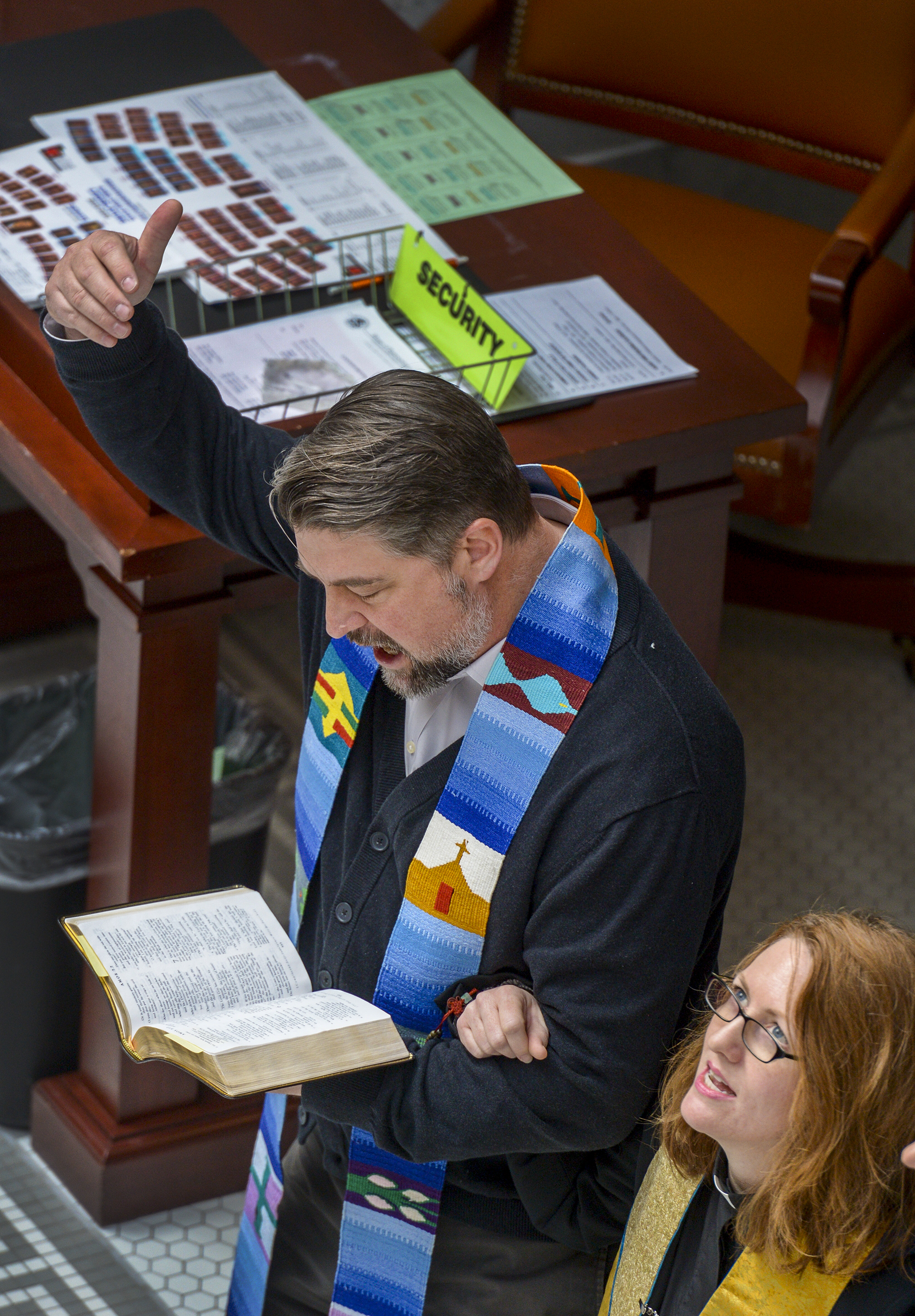 Leah Hogsten | The Salt Lake Tribune Faith leaders l-r Rev. Curtis Price with The First Baptist Church of Salt Lake City and Rev. Monica Dobbins with the First Unitarian Church of Salt Lake City recite scripture and sing in opposition to SB96 outside the Utah House chambers, Feb. 8, 2019. 