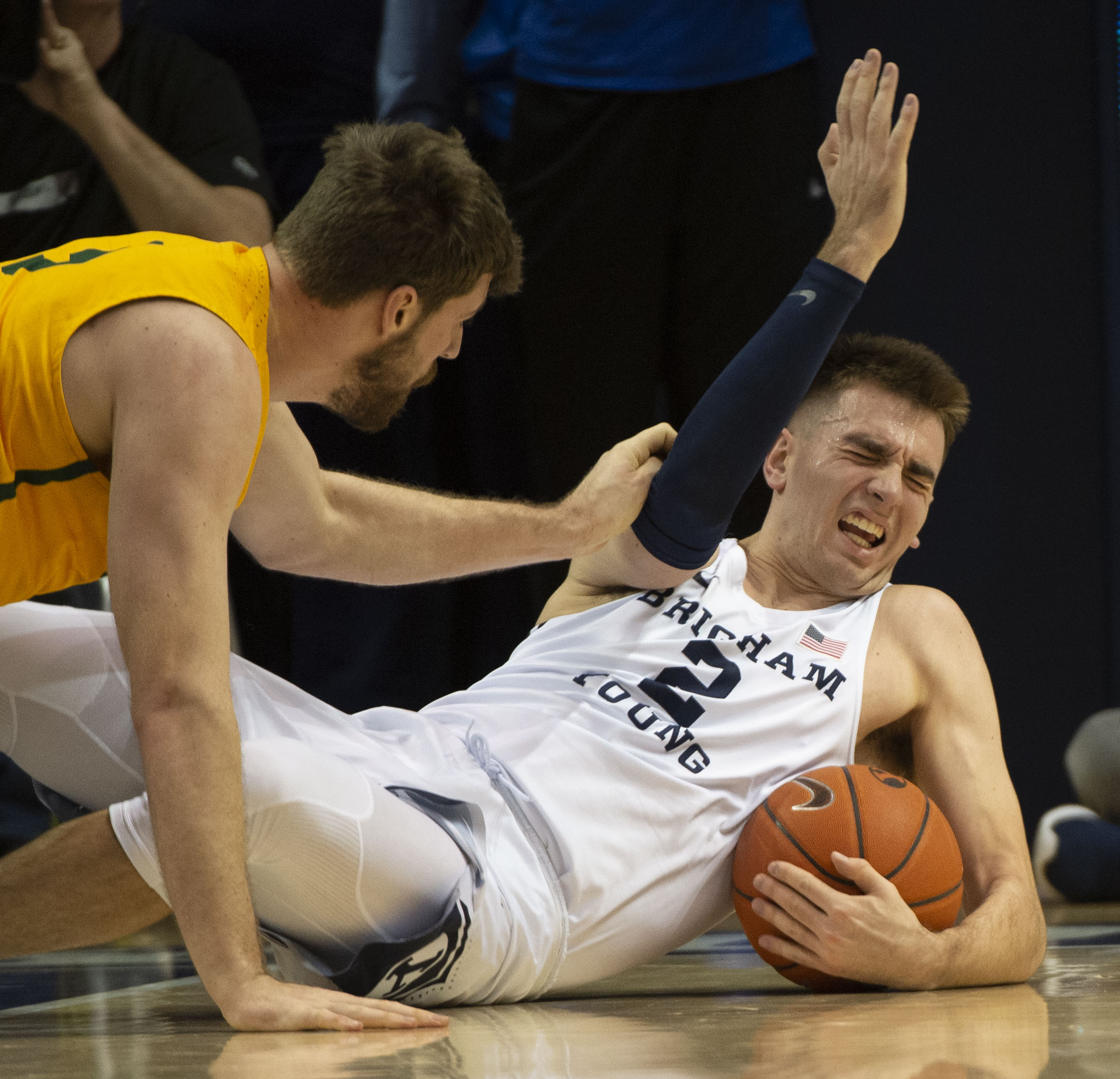 (Rick Egan | The Salt Lake Tribune) San Francisco Dons center Jimbo Lull (5) goes for a loose ball along with Brigham Young Cougars guard Zac Seljaas (2), in WCC basketball action at the Marriott Center, Thursday, February 21, 2018. 
