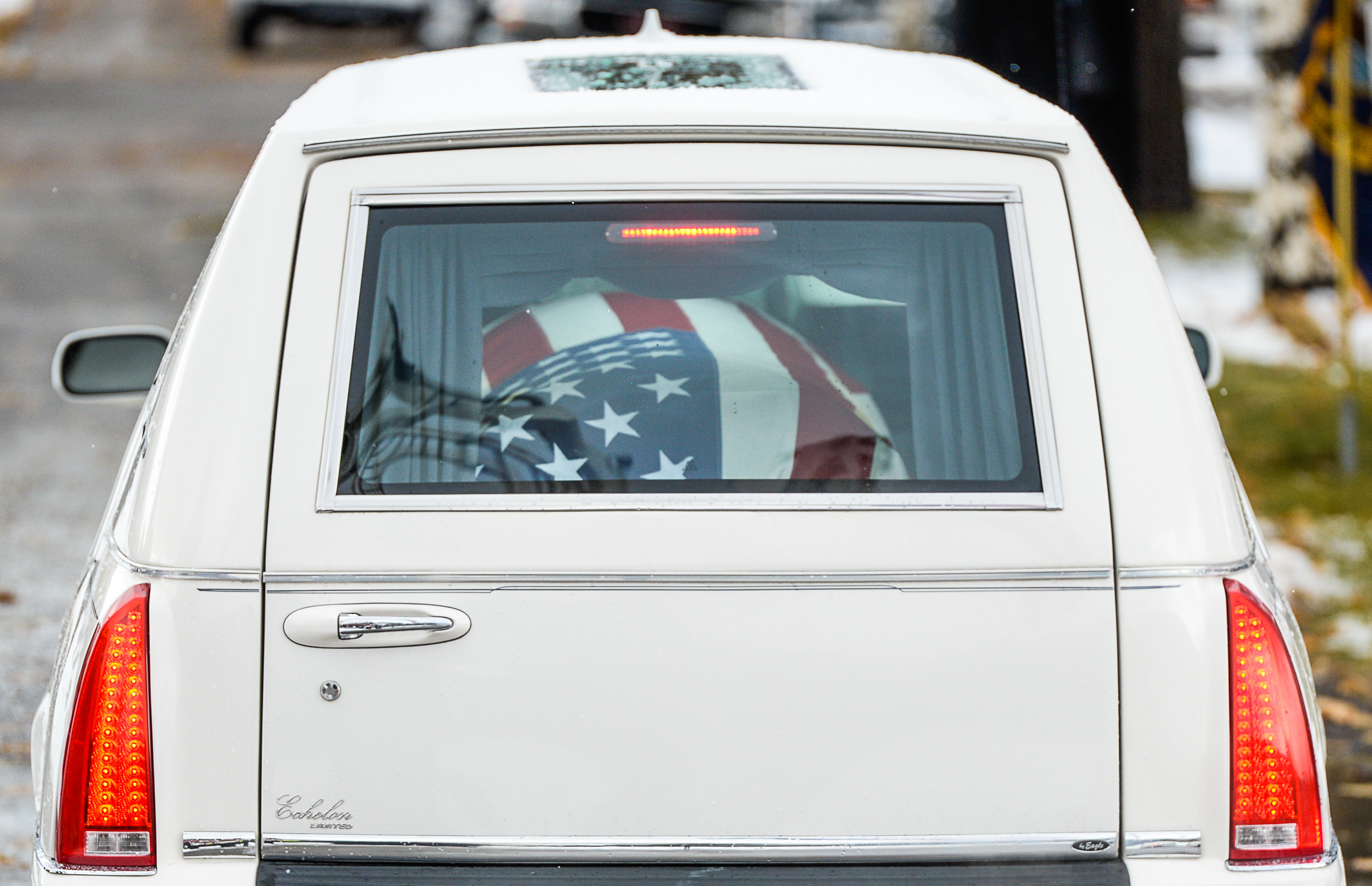 (Francisco Kjolseth | The Salt Lake Tribune) The flag-draped casket of former congressman Jim Hansen arrives at the Farmington City Cemetery, Saturday, Nov. 24, 2018.