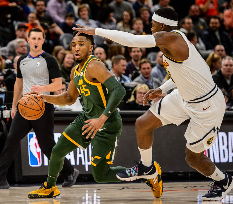 (Trent Nelson | The Salt Lake Tribune) Utah Jazz guard Donovan Mitchell (45) and Denver Nuggets forward Paul Millsap (4) as the Utah Jazz host the Denver Nuggets, NBA basketball in Salt Lake City on Wednesday Jan. 23, 2019.