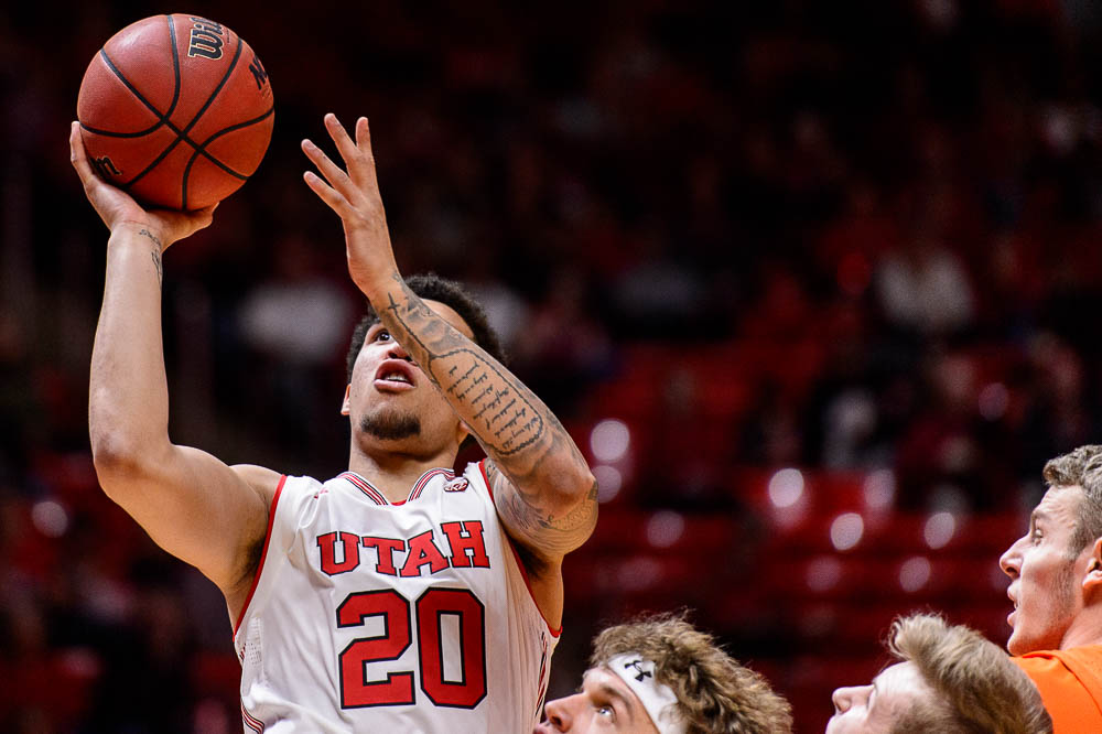 (Trent Nelson | The Salt Lake Tribune) Utah Utes forward Timmy Allen (20) shoots as Utah hosts Oregon State, NCAA basketball in Salt Lake City on Saturday Feb. 2, 2019.