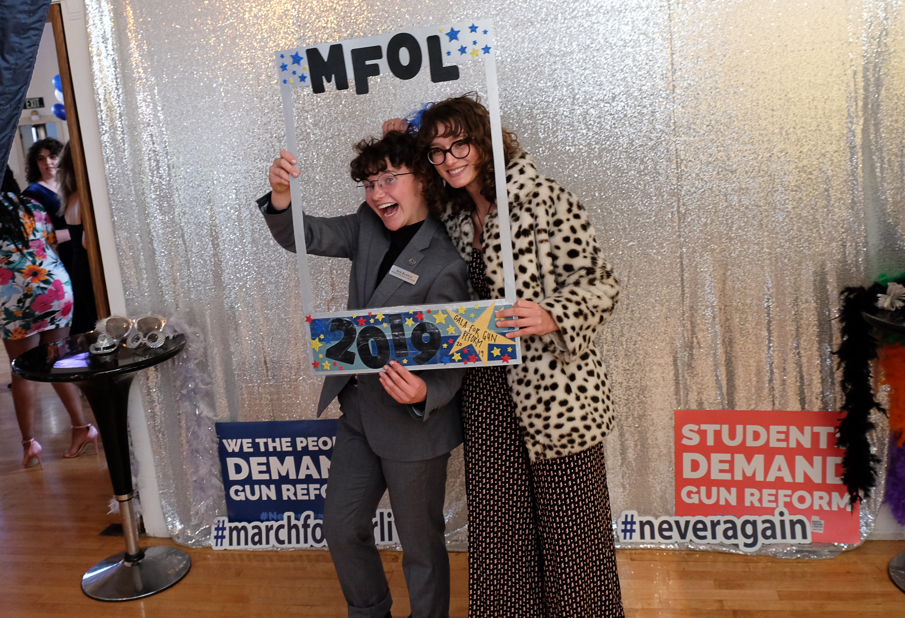 (Francisco Kjolseth | The Salt Lake Tribune) Ace Slagle, left, and Anna Penner pose for a photograph as they take a break from helping put on gala by March for Our Lives Utah. Students hosted the gala for gun reform at the Ladies Literary Club Clubhouse on Saturday, April 6, 2019.