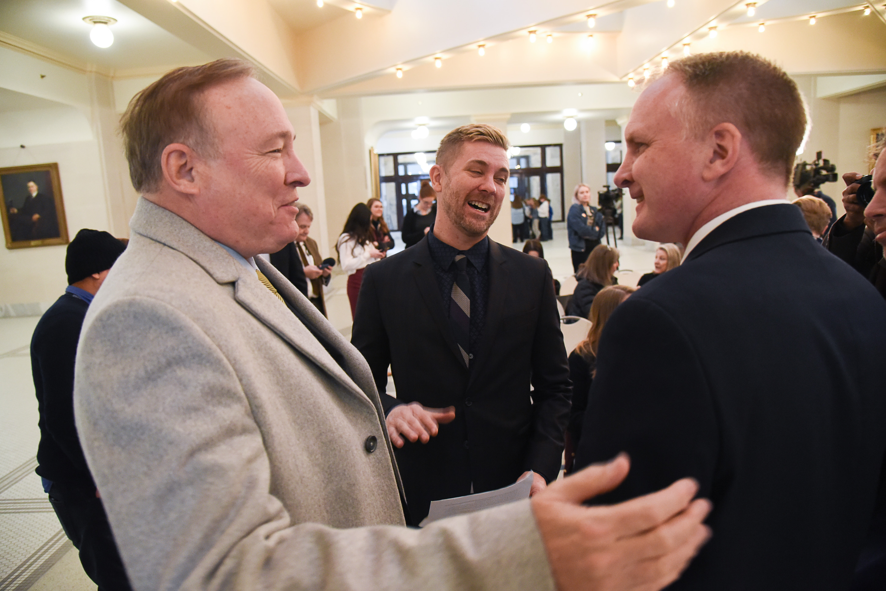 (Francisco Kjolseth | The Salt Lake Tribune) Former Utah senator Jim Dabakis meets with Equality Utah's Troy Williams, center, and Rep. Craig Hall, R-West Valley, before legislation was introduced at the Utah Capitol to ban conversion therapy on Thursday, Feb. 21, 2019. .