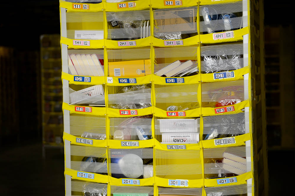 (Trent Nelson | The Salt Lake Tribune) Sorted items at Amazon's fulfillment center in Salt Lake City on Wednesday April 17, 2019.