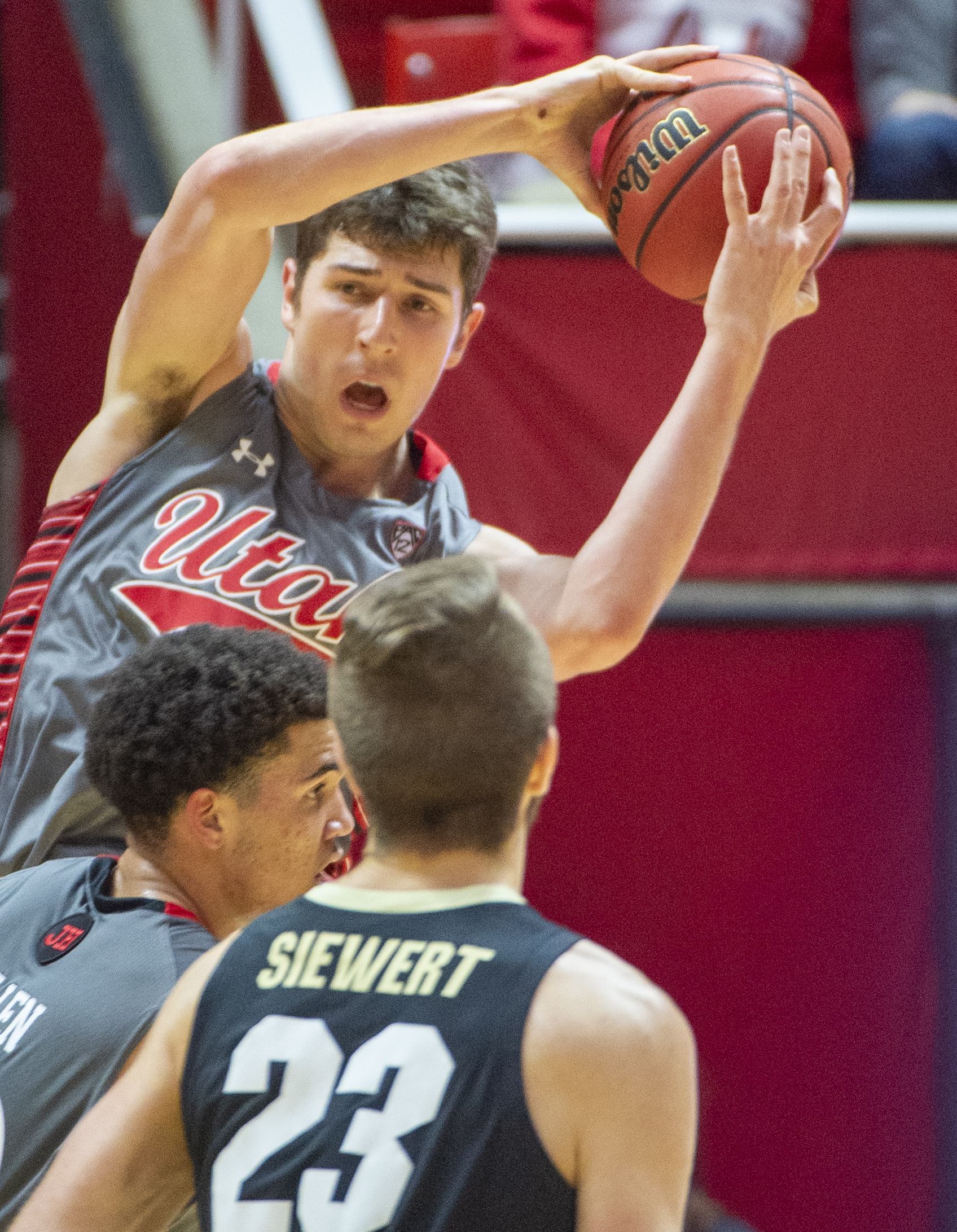 (Rick Egan | The Salt Lake Tribune) Utah forward Riley Battin (21) grabs a rebound for the Utes, in PAC-12 basketball action between the Utah Utes and the Colorado Buffaloes at the Jon M. Huntsman Center, Sunday, Jan. 20, 2019. 
