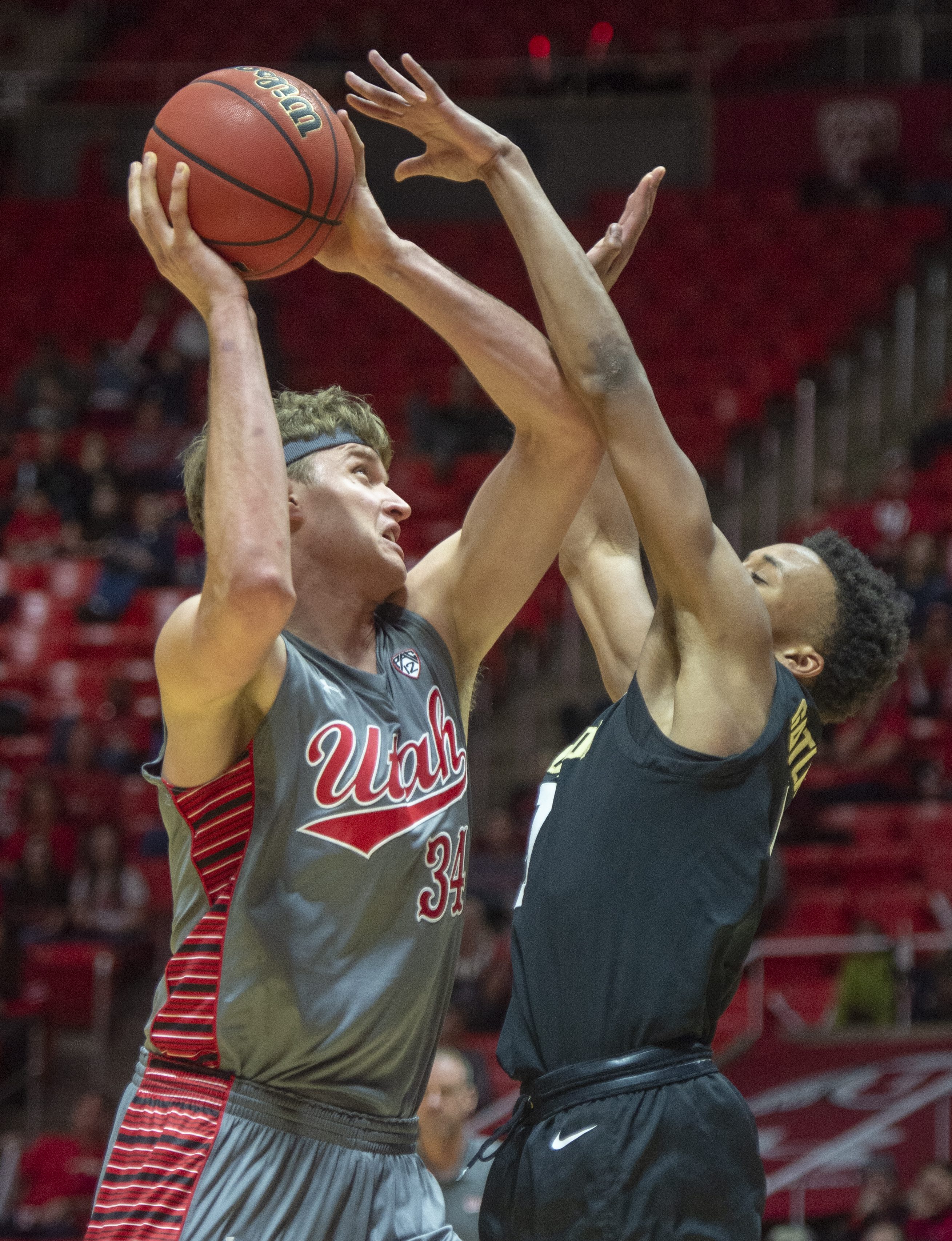 (Rick Egan | The Salt Lake Tribune) Utah Utes guard Naseem Gaskin (0) goes to the hoop as Colorado Buffaloes guard Shane Gatling (0) defends, in PAC-12 basketball action between the Utah Utes and the Colorado Buffaloes at the Jon M. Huntsman Center, Sunday, Jan. 20, 2019. 