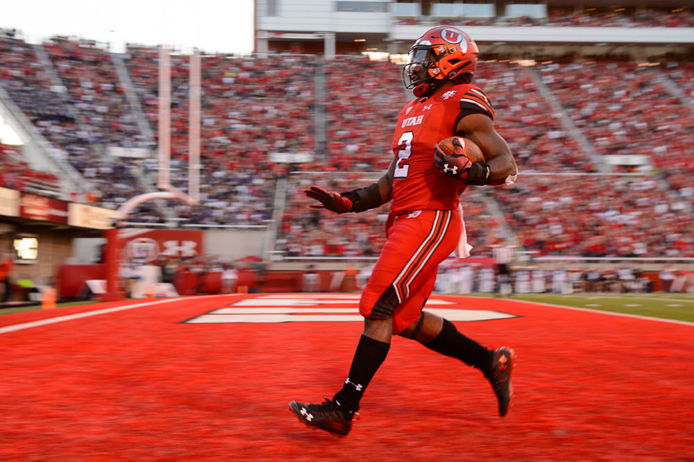 (Trent Nelson | The Salt Lake Tribune) Utah Utes running back Zack Moss (2) scores a touchdown as the University of Utah Utes host the Weber State Wildcats, Thursday Aug. 30, 2018 at Rice-Eccles Stadium in Salt Lake City.
