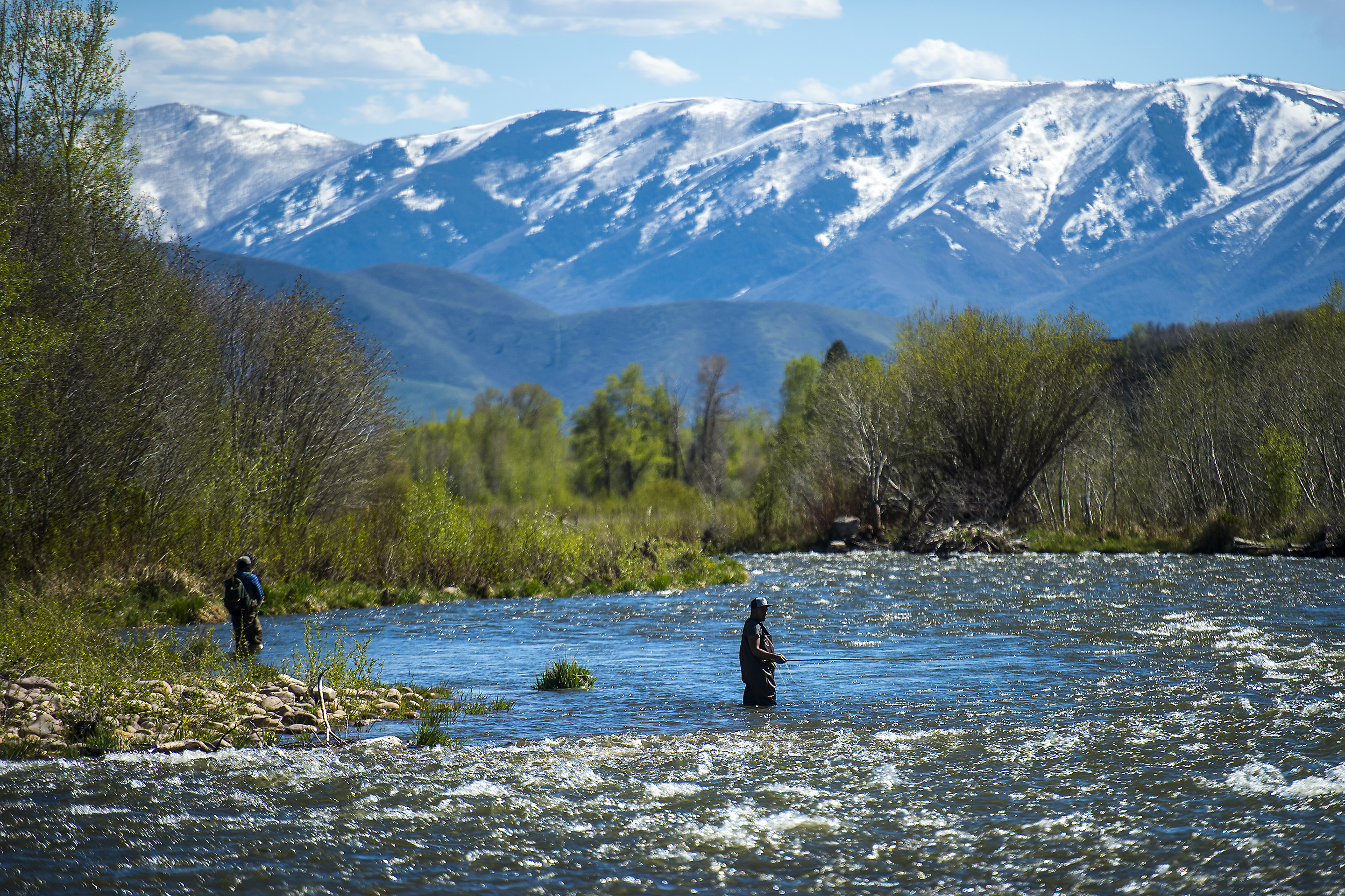 (Chris Detrick | Tribune file photo) Kevin Duron, right, and Luis Parriles, both of Orem, fish in the Provo River near Heber City Friday, May 5, 2017. 