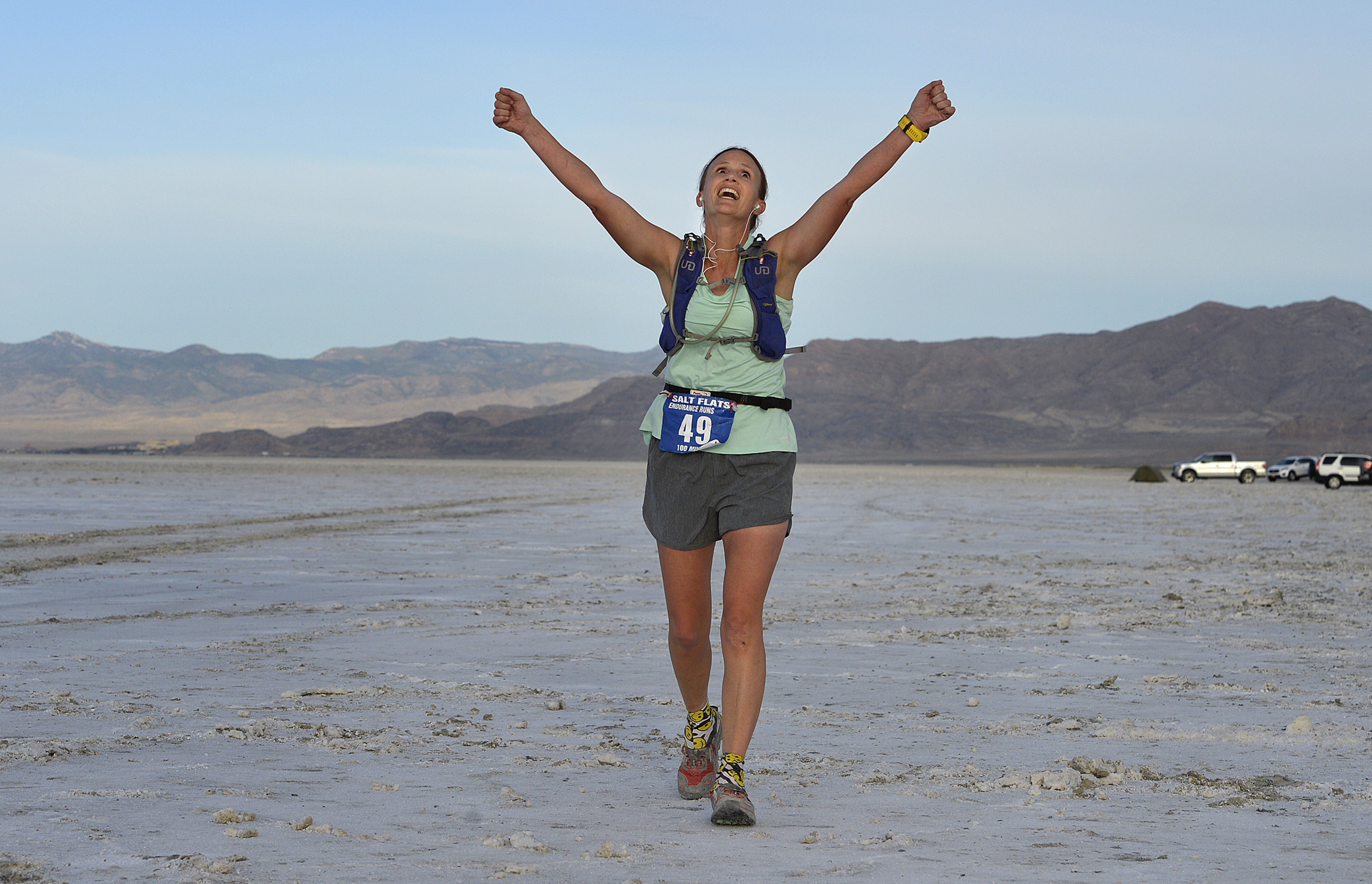 (Scott Sommerdorf | The Salt Lake Tribune) Melissa Soper celebrates as she crosses the finish line at the Salt Flats 100 Endurance Run, Saturday, May 5, 2018. Soper was the first woman to finish the race. She finished 9th overall. 