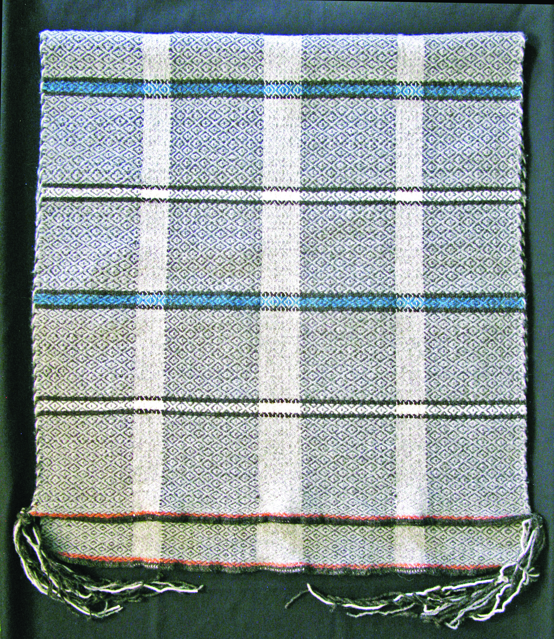 Textiles by Navajo artist Morris Muskett are on show at the sixth annual Indian Art Market at the Natural History Museum of Utah.