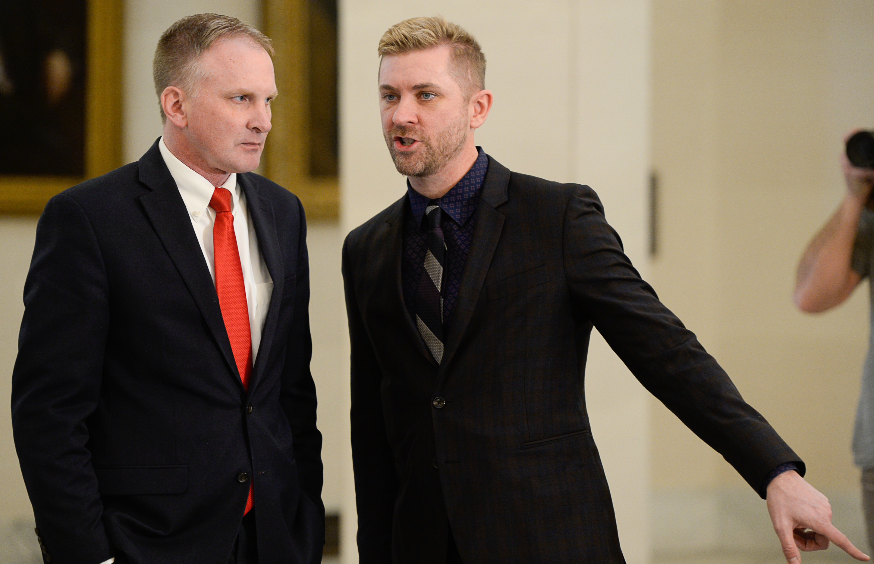 (Francisco Kjolseth | The Salt Lake Tribune) Equality Utah's Troy Williams, right, speaks with Rep. Craig Hall, R-West Valley, one of the sponsors of legislation to ban conversion therapy as they gather for a press event at the Utah Capitol on Thursday, Feb. 21, 2019.