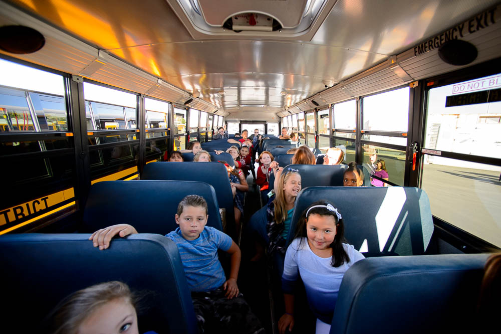 (Trent Nelson | The Salt Lake Tribune) Fourth graders from Terra Linda Elementary arrive at a news conference introducing thirty-six new CNG school buses have been added to the Jordan School District fleet this year, bringing the total to 105, the largest fleet of CNG school buses in Utah. Wednesday Sept. 12, 2018.