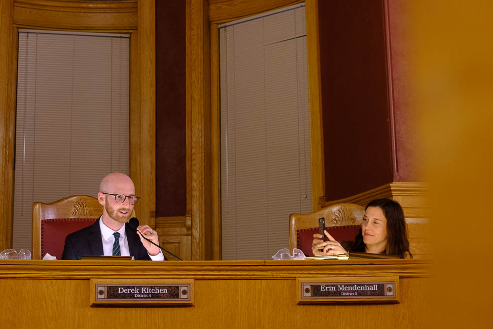 (Trent Nelson | The Salt Lake Tribune) Outgoing Salt Lake City Council Member Derek Kitchen gives his farewell marks at the council meeting on Tuesday Nov. 27, 2018. At right, Erin Mendenhall takes a photo, and at left is Chris Wharton.