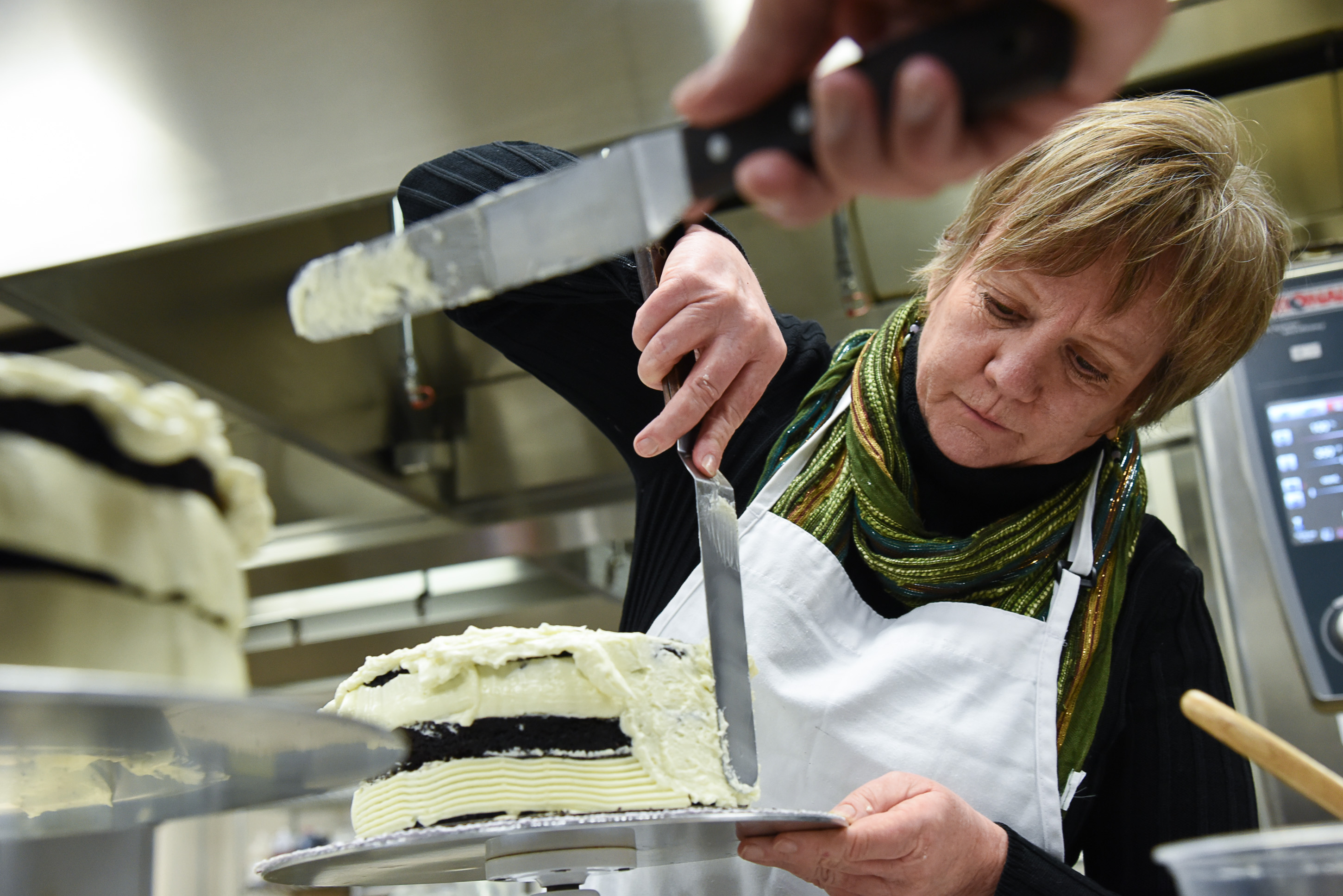 (Francisco Kjolseth | The Salt Lake Tribune) Learning a new craft, actress Betsy West prepares for an upcoming role of a Southern Baptist bakery owner in North Carolina faced with a request to bake a cake for a gay couple getting married for Salt Lake Acting Company's production of "The Cake." A self admitted baking novice, West, in search of better authenticity in portraying her role received a one-on-one lesson from the chef's at Flourish.