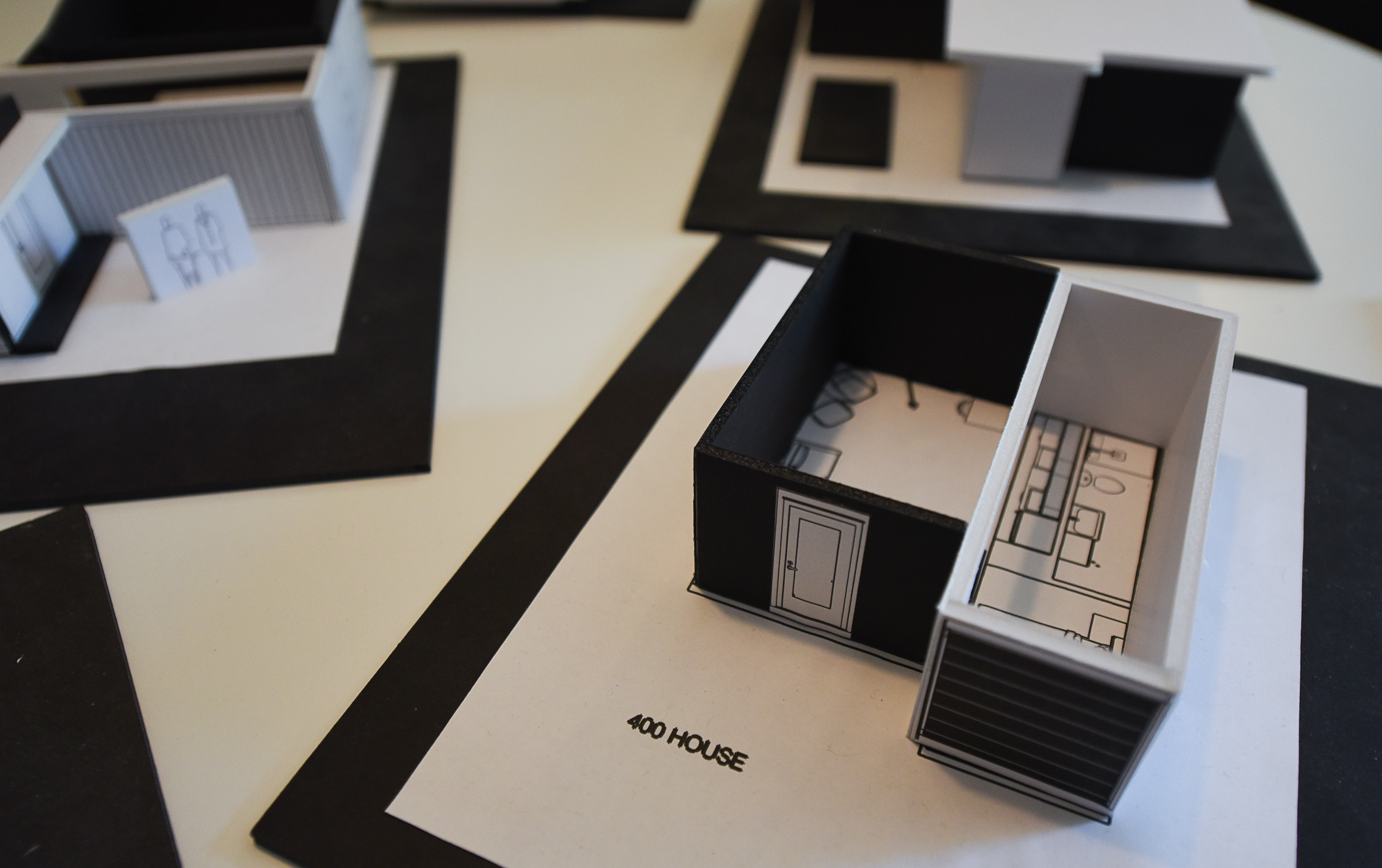(Francisco Kjolseth | The Salt Lake Tribune) Shipping container housing models are on display during a recent tour. Our Homes, Our Voices, a campaign to bring more attention to the affordable housing crisis across the country showcases one of the solutions being presented by small house specialist Jeff White in Sat Lake City on Wed. May 2, 2018. White has been investing his time now for several years on shipping container prototypes, including a 432 square foot experimental home he built inside a warehouse in Salt Lake that would cost about $36,000 and be easy to assemble on a lot.