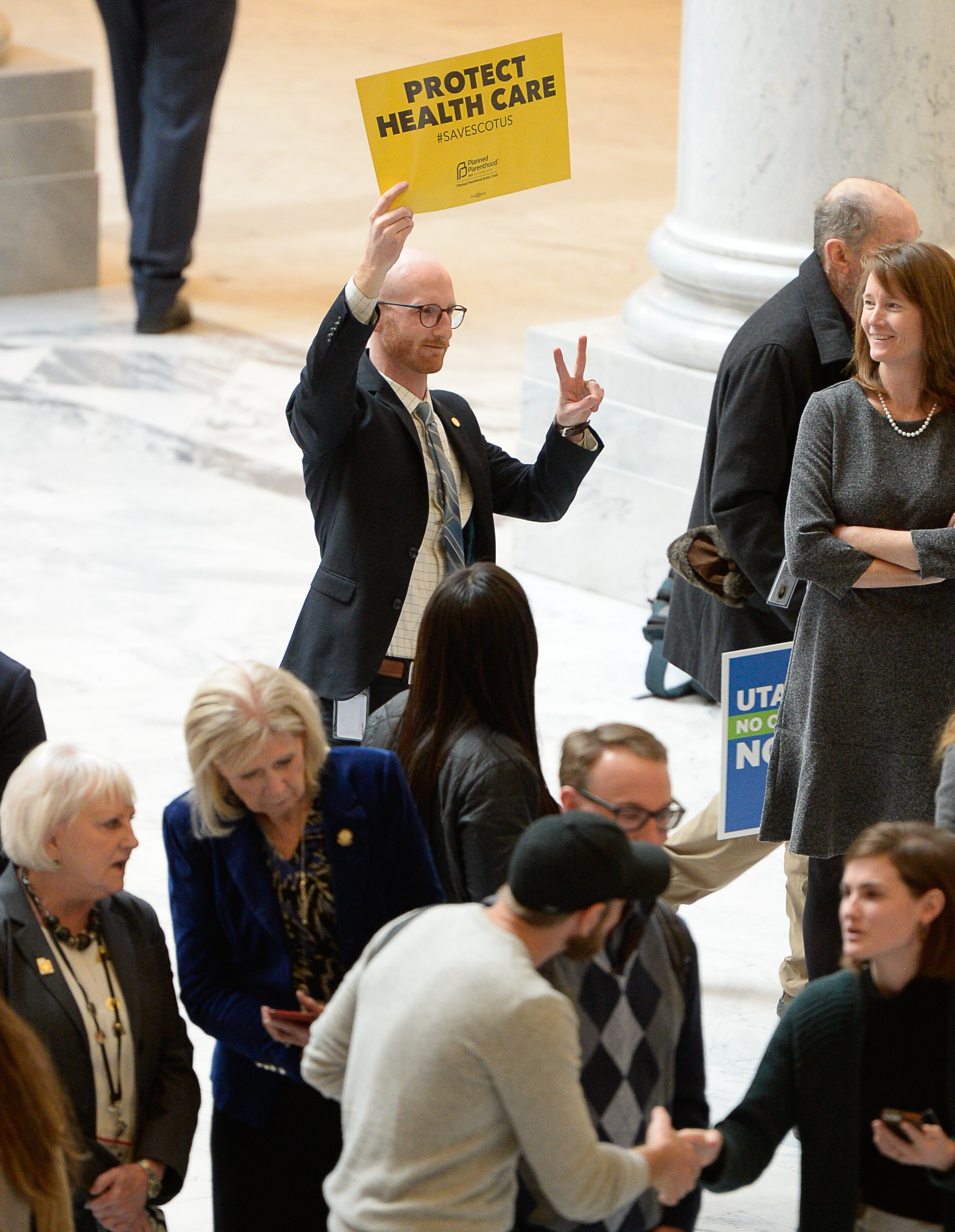 (Francisco Kjolseth | The Salt Lake Tribune) Newly elected Sen. Derek Kitchen, D-Salt Lake, shows his support for the demonstrators gathered in the Capitol rotunda on Monday, Jan, 28, 2019, on the first day of the Legislative session to rally in support of protecting Proposition 3, the Medicaid Expansion law recently passed by voters.